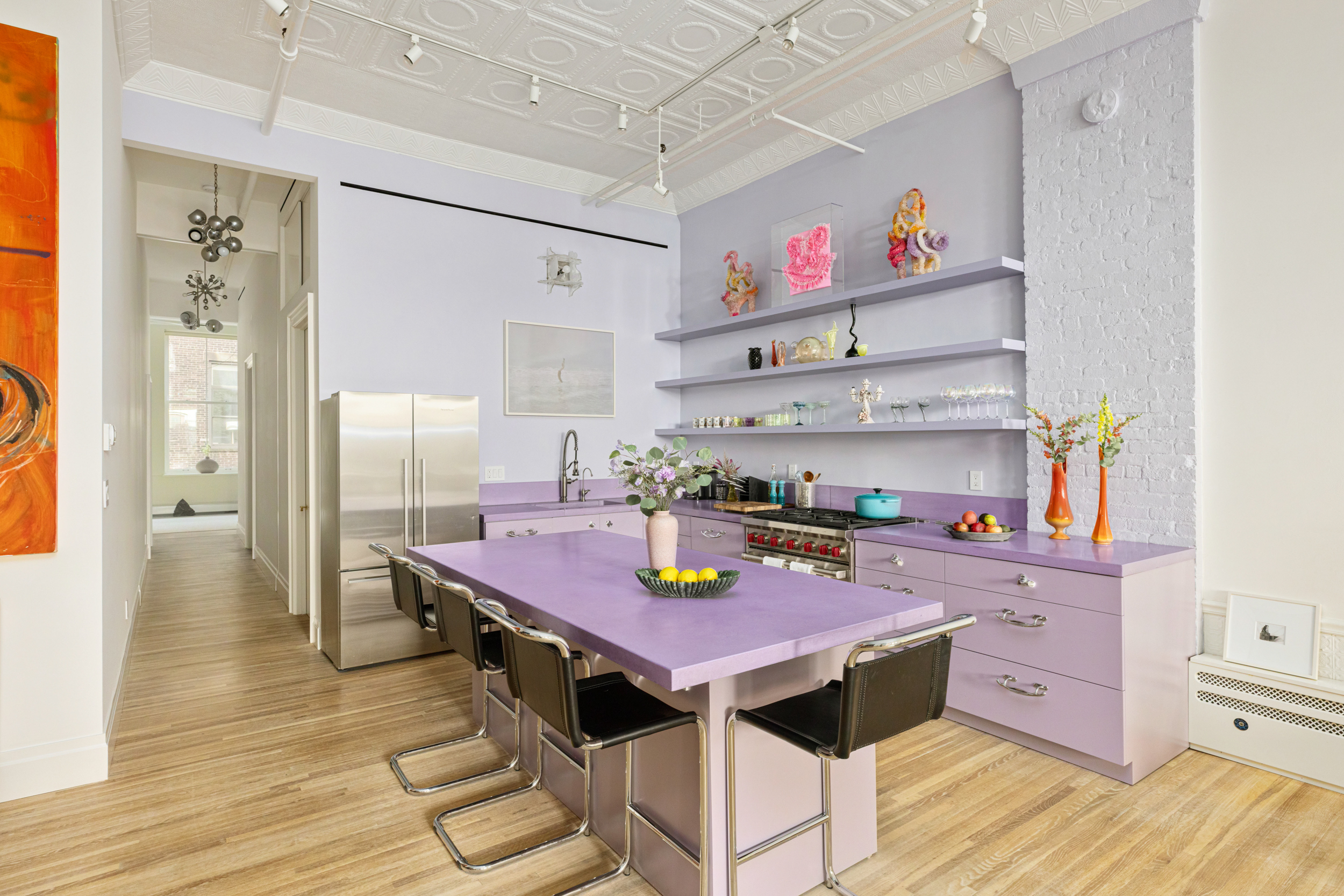 55 Walker Street, Unit 3A Manhattan, NY 10013 - Photo 6 of 12 a view of kitchen with cabinets and wooden floor