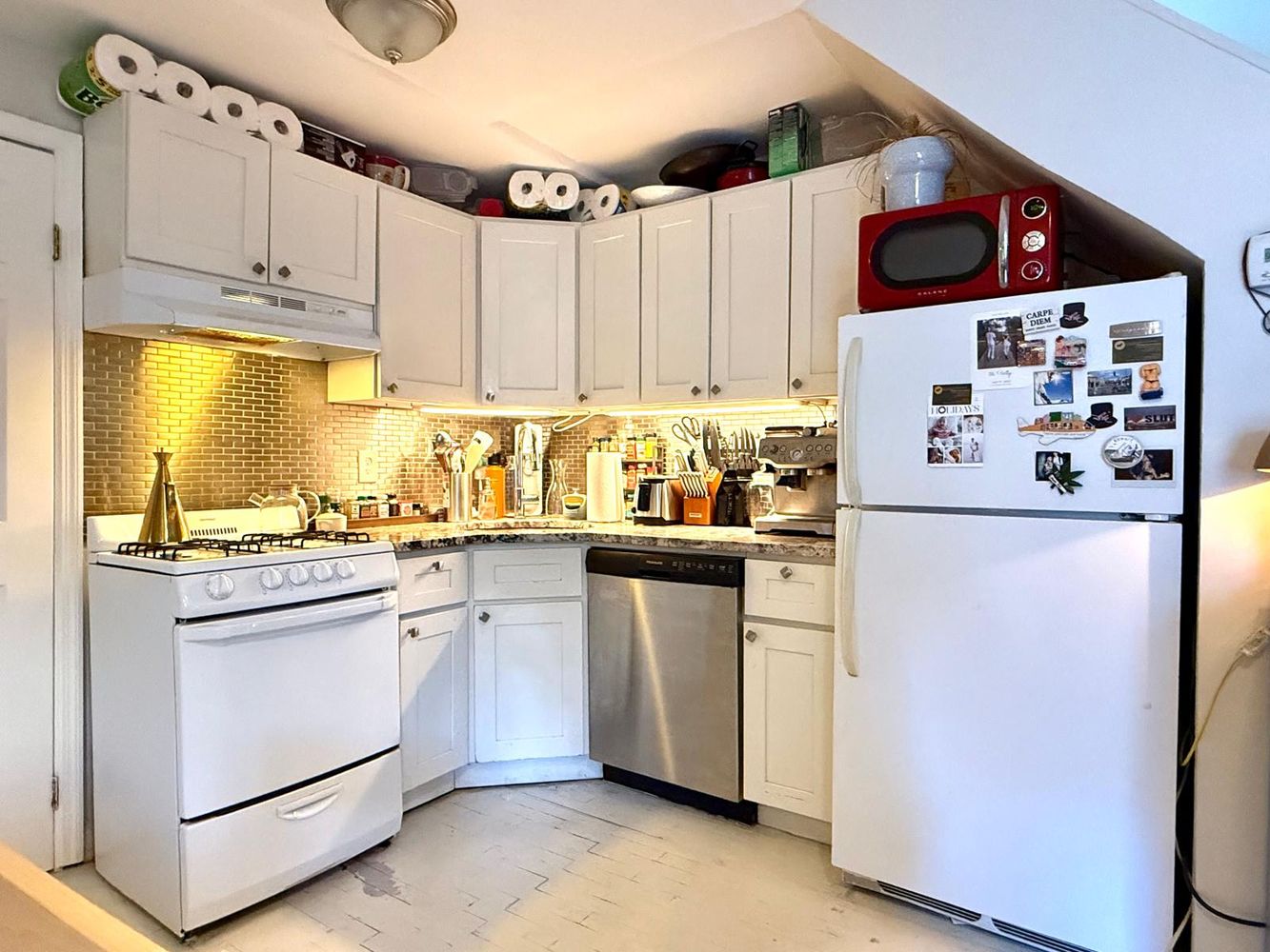 269 Ainslie Street Brooklyn, NY 11211 - Photo 14 of 22 a refrigerator freezer sitting inside of a kitchen
