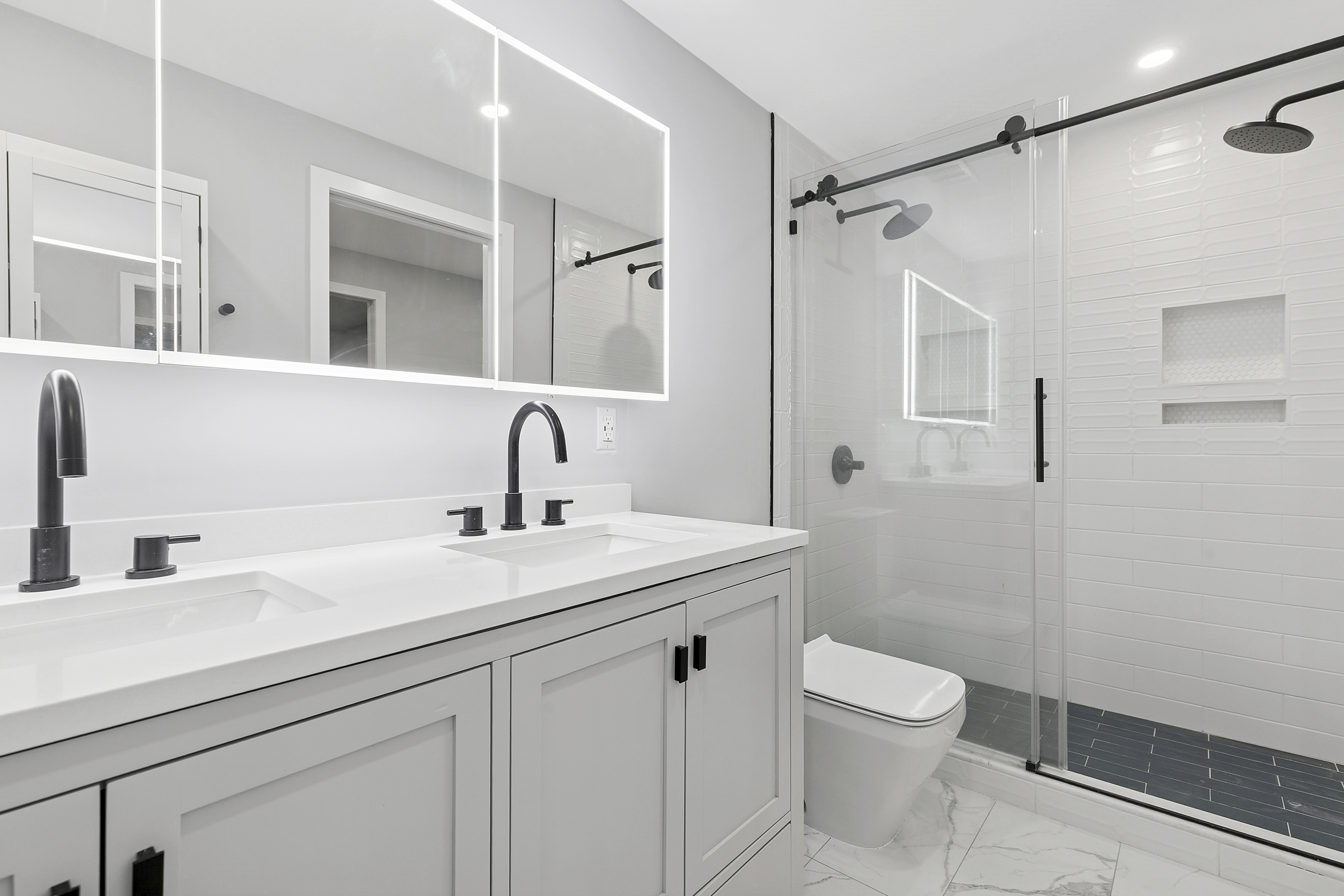 434 Throop Avenue, Unit 2 Brooklyn, NY 11221 - Photo 9 of 20 a bathroom with a sink toilet and shower