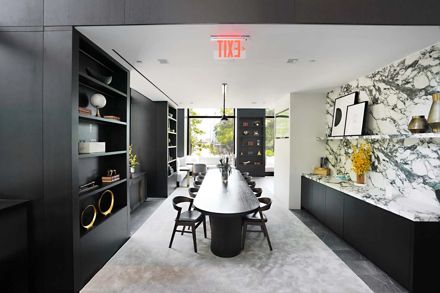 a room with furniture a air conditioner vent and a window