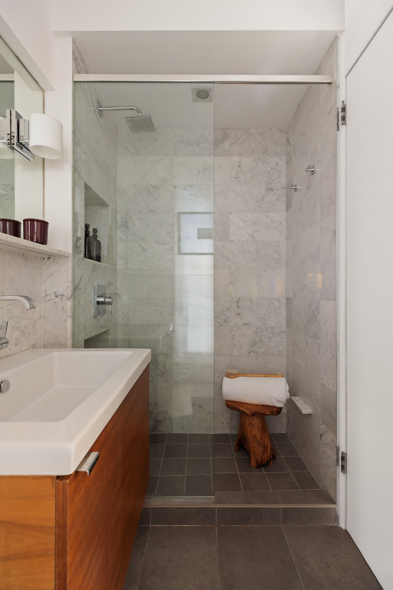 31 Jane Street, Unit 16G Manhattan, NY 10014 - Photo 17 of 20 a bathroom with a sink a toilet and shower
