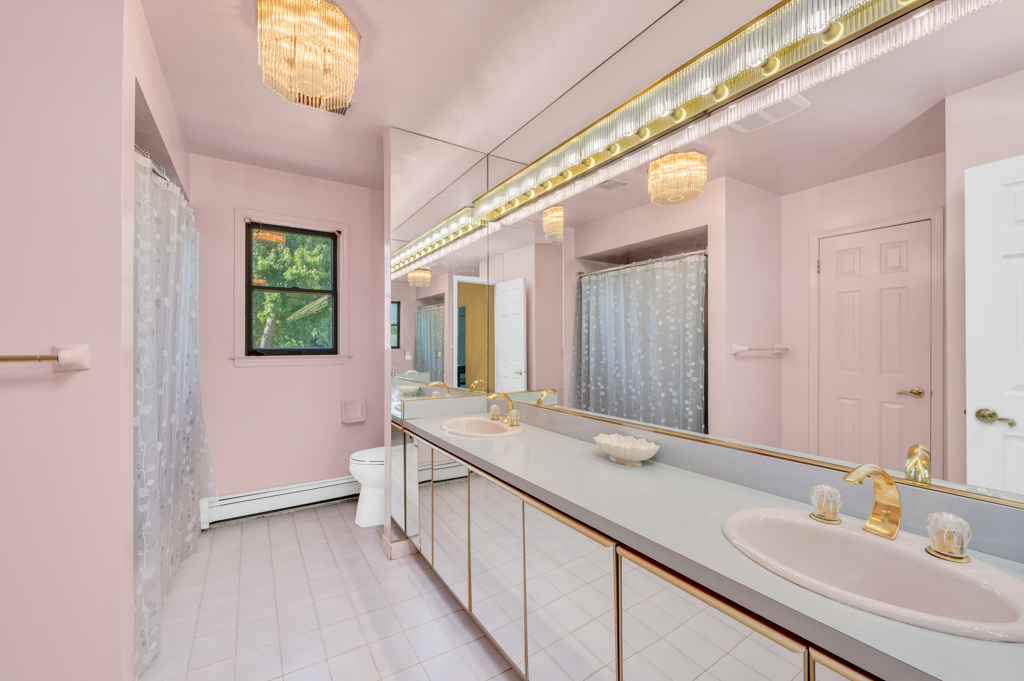 35 Poe Street Staten Island, NY 10307 - Photo 20 of 36 a bathroom with a sink and a mirror