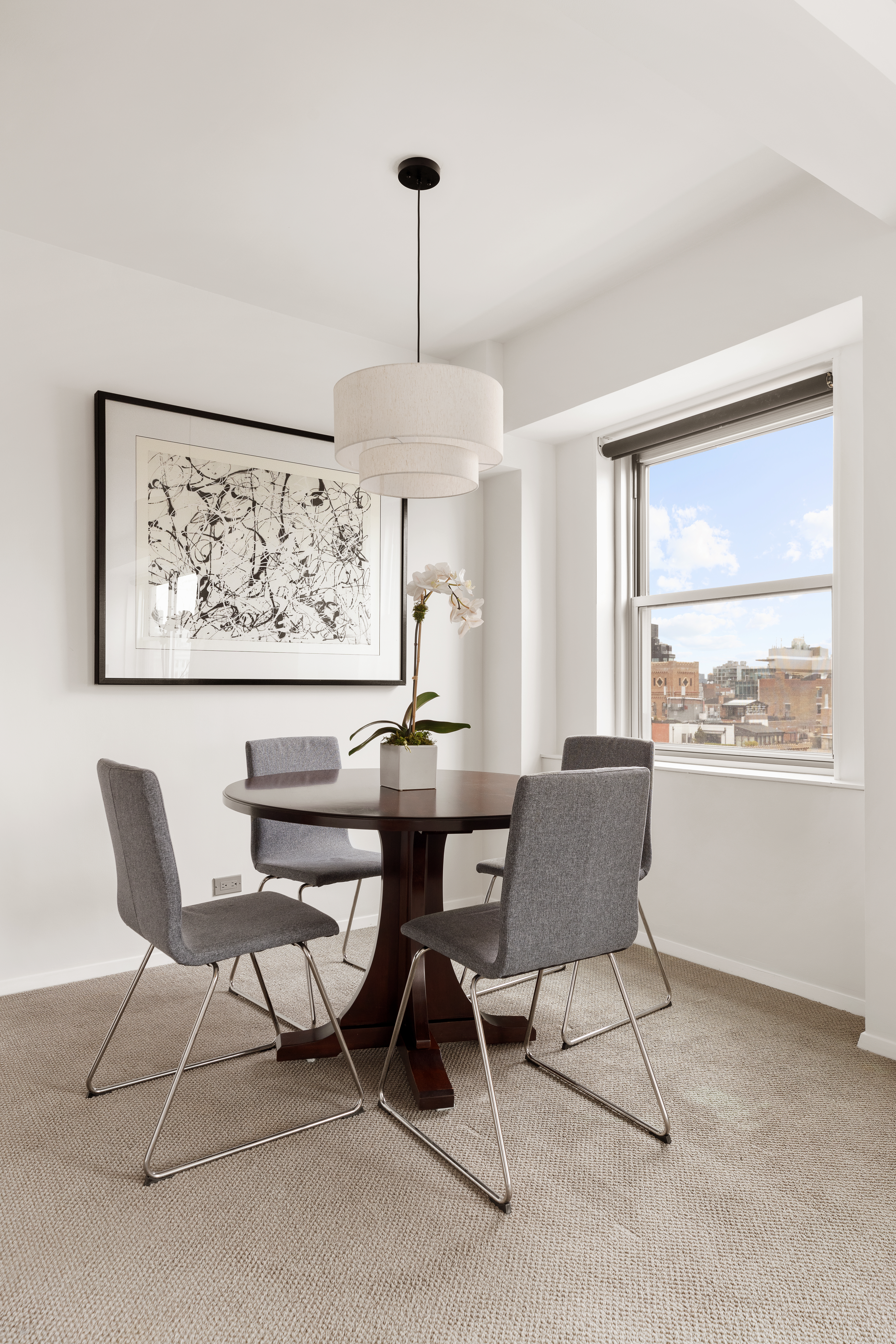 11 5th Avenue, Unit 18A Manhattan, NY 10003 - Photo 2 of 11 a dining room with furniture and window