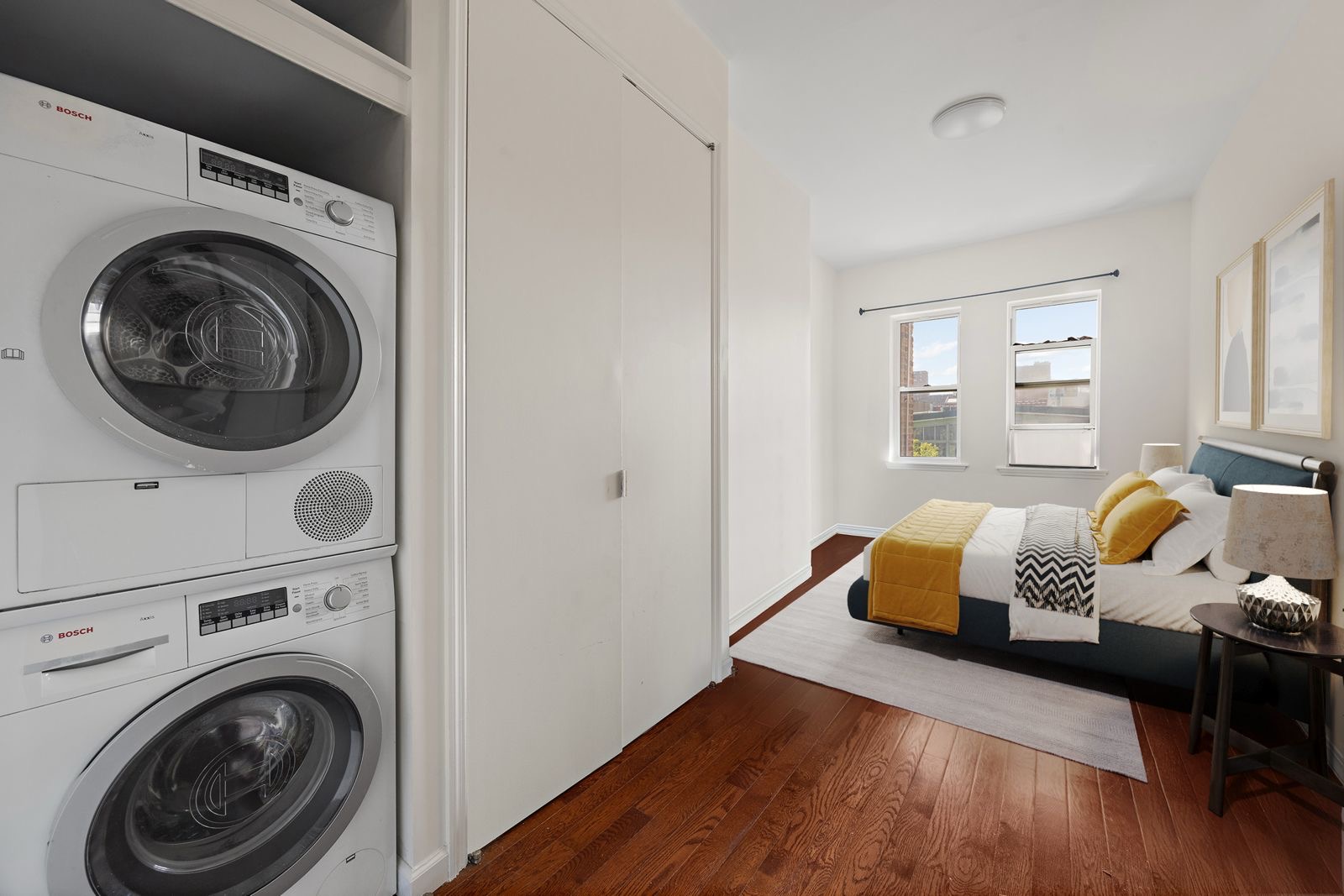 25 Bogart Street, Unit 3S Brooklyn, NY 11206 - Photo 5 of 7 a bedroom with a bed and glass window