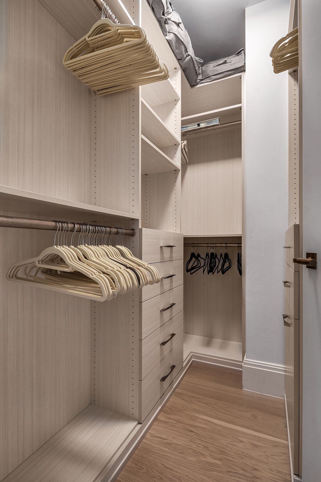 438 East 12th Street, Unit 6F Manhattan, NY 10009 - Photo 9 of 27 a view of walk in closet with clothes and shoes