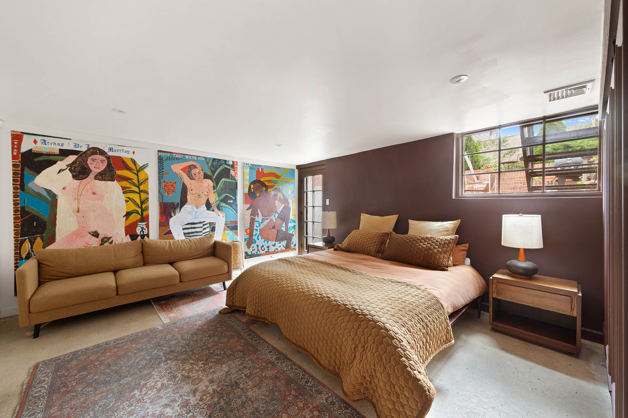 209 Onderdonk Avenue Queens, NY 11385 - Photo 12 of 16 a bedroom with furniture and a couch