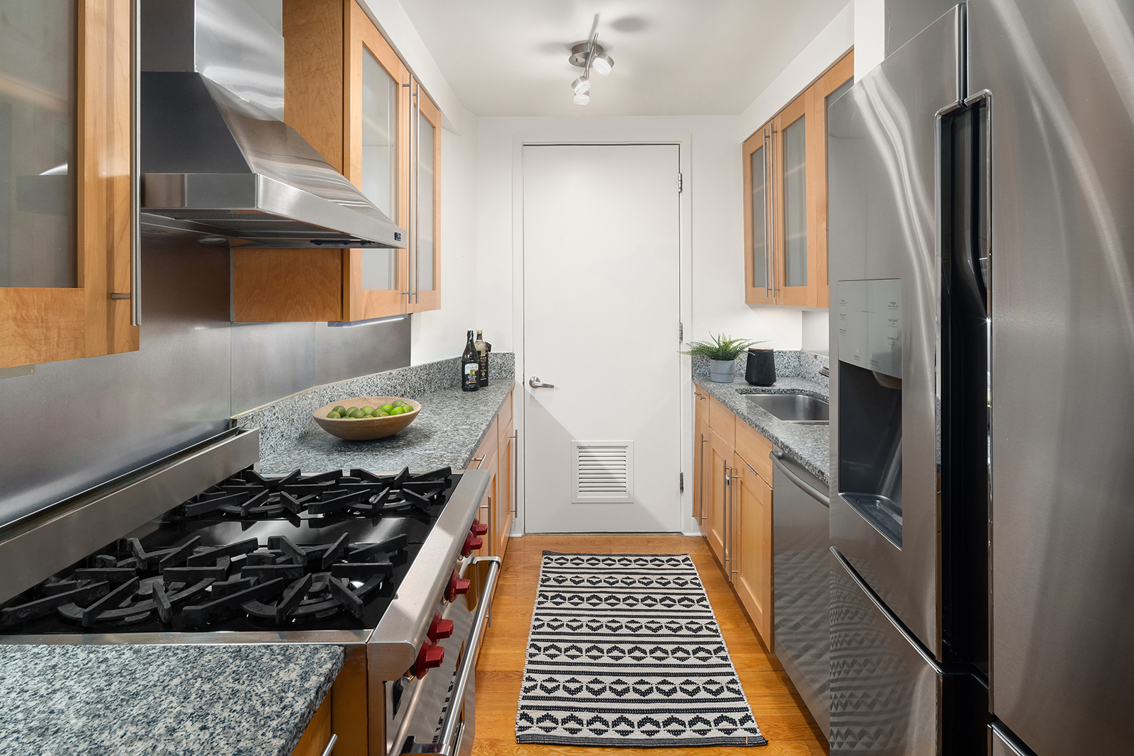 401 Hicks Street, Unit A3I Brooklyn, NY 11201 - Photo 4 of 16 a kitchen with a stove a sink and a refrigerator