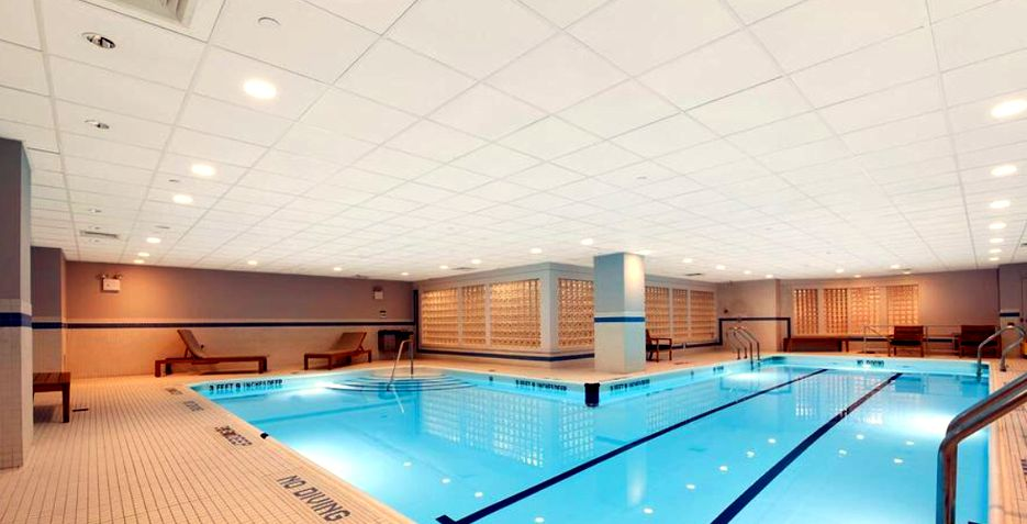 120 East 87th Street, Unit R16G Manhattan, NY 10128 - Photo 16 of 20 a view of a living room and kitchen