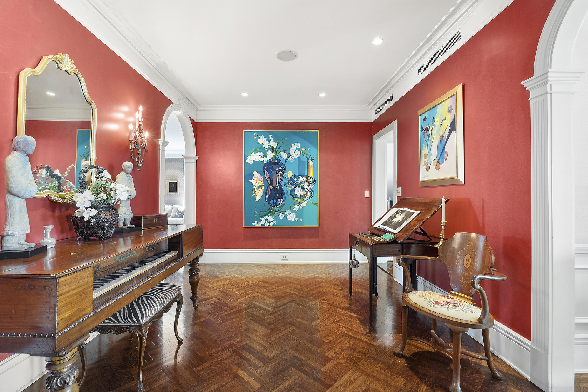 31 East 79th Street, Unit 10E Manhattan, NY 10075 - Photo 4 of 11 a room with furniture and a potted plant