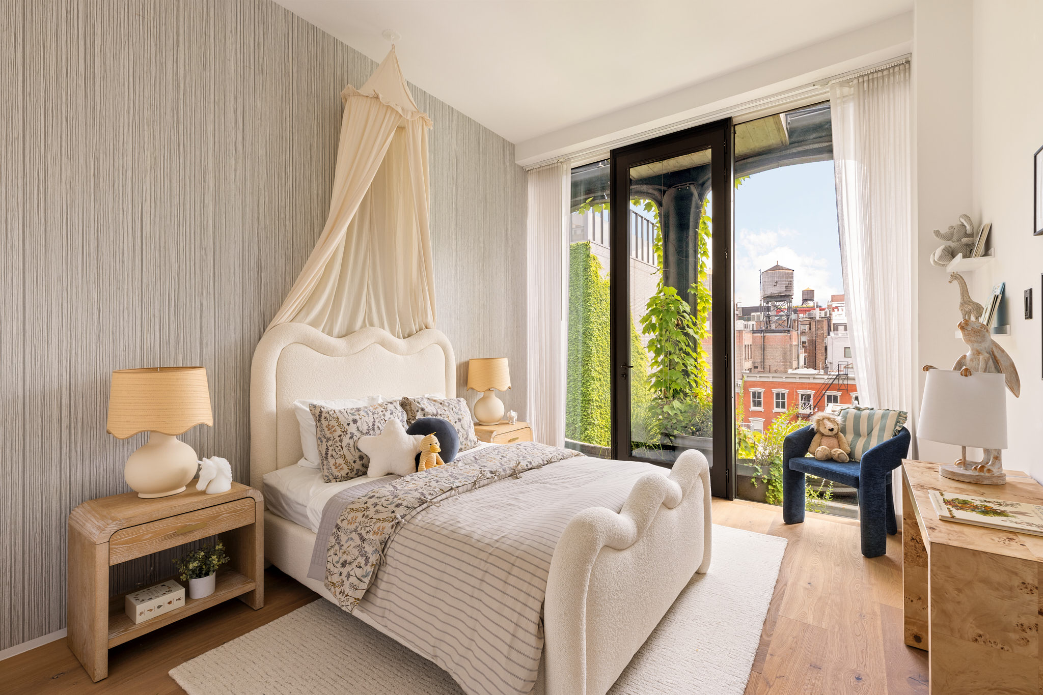 325 West Broadway, Unit 7B Manhattan, NY 10013 - Photo 9 of 21 a bedroom with a bed and a large window