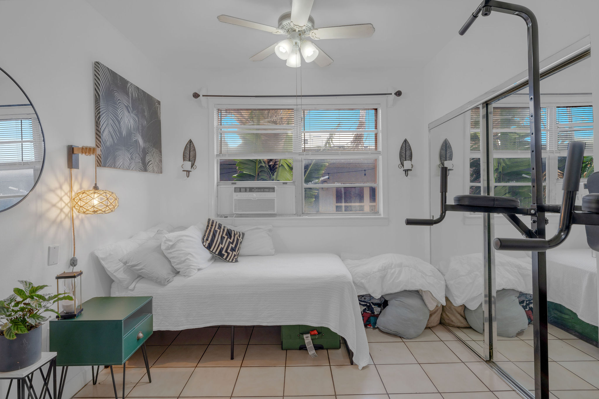 735-745 Meridian Avenue Miami Beach, FL 33139 - Photo 35 of 62 a bedroom with furniture and a large window