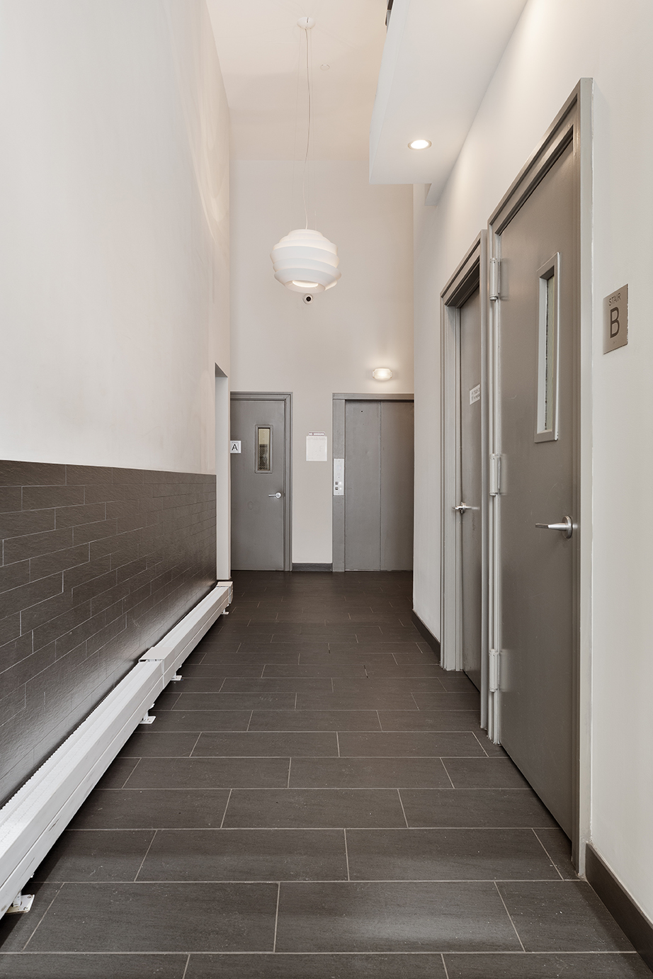 60 West 14th Street, Unit 7C Manhattan, NY 10011 - Photo 8 of 10 a view of a hallway with closet