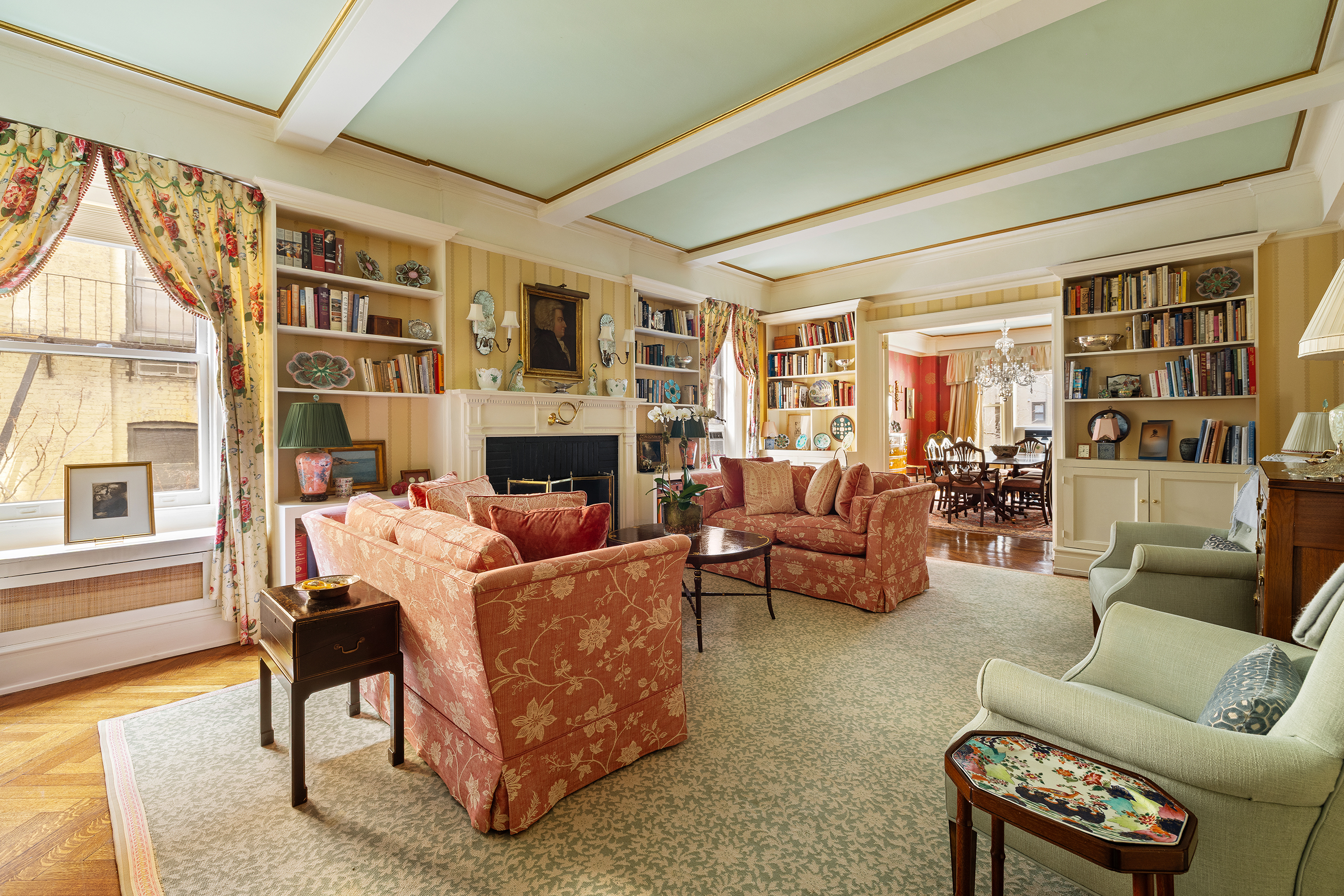 70 East 77th Street, Unit 6A Manhattan, NY 10075 - Photo 1 of 17 a living room with furniture and a fireplace