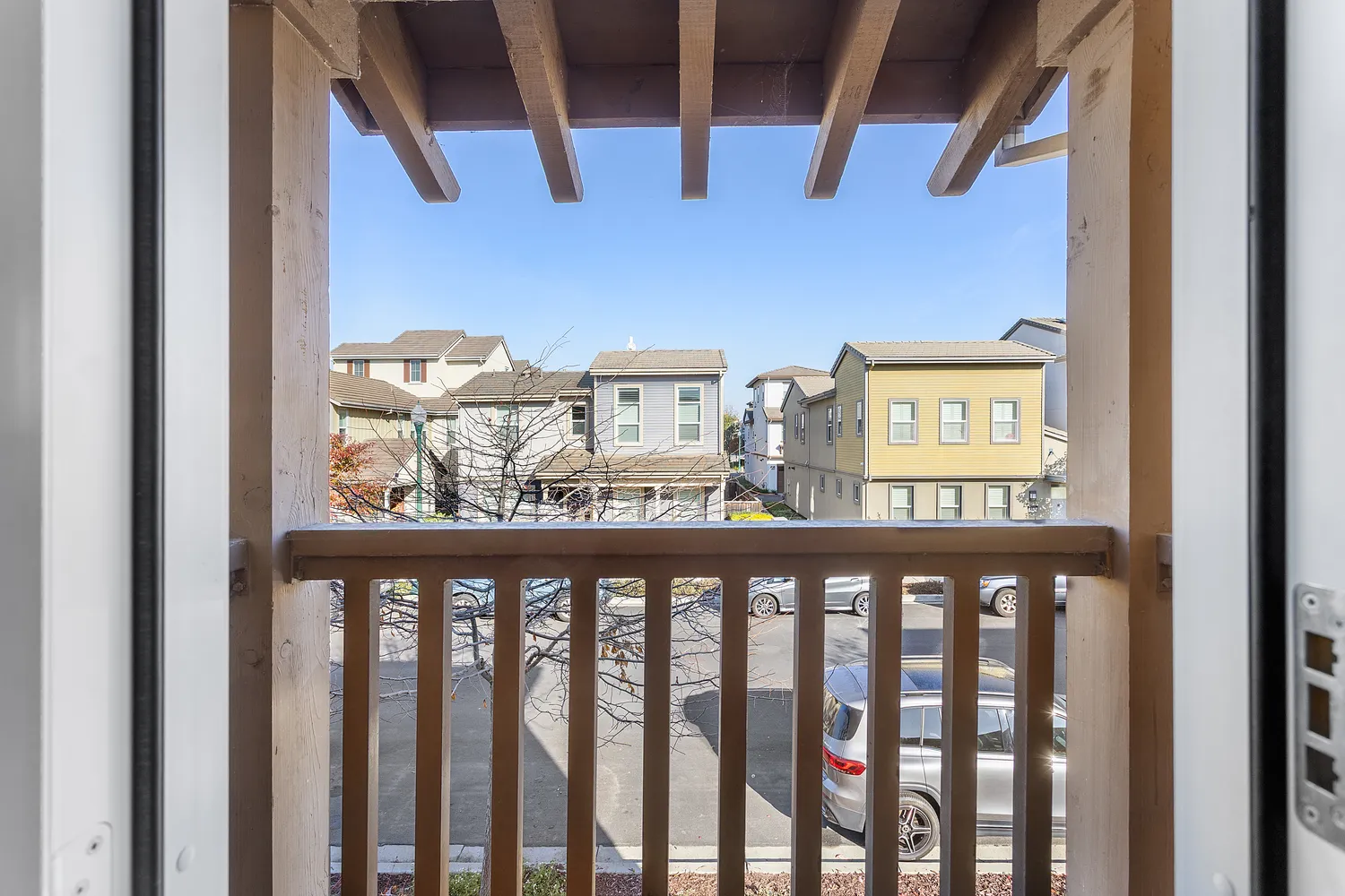 a white toilet sitting next to a shower curtain