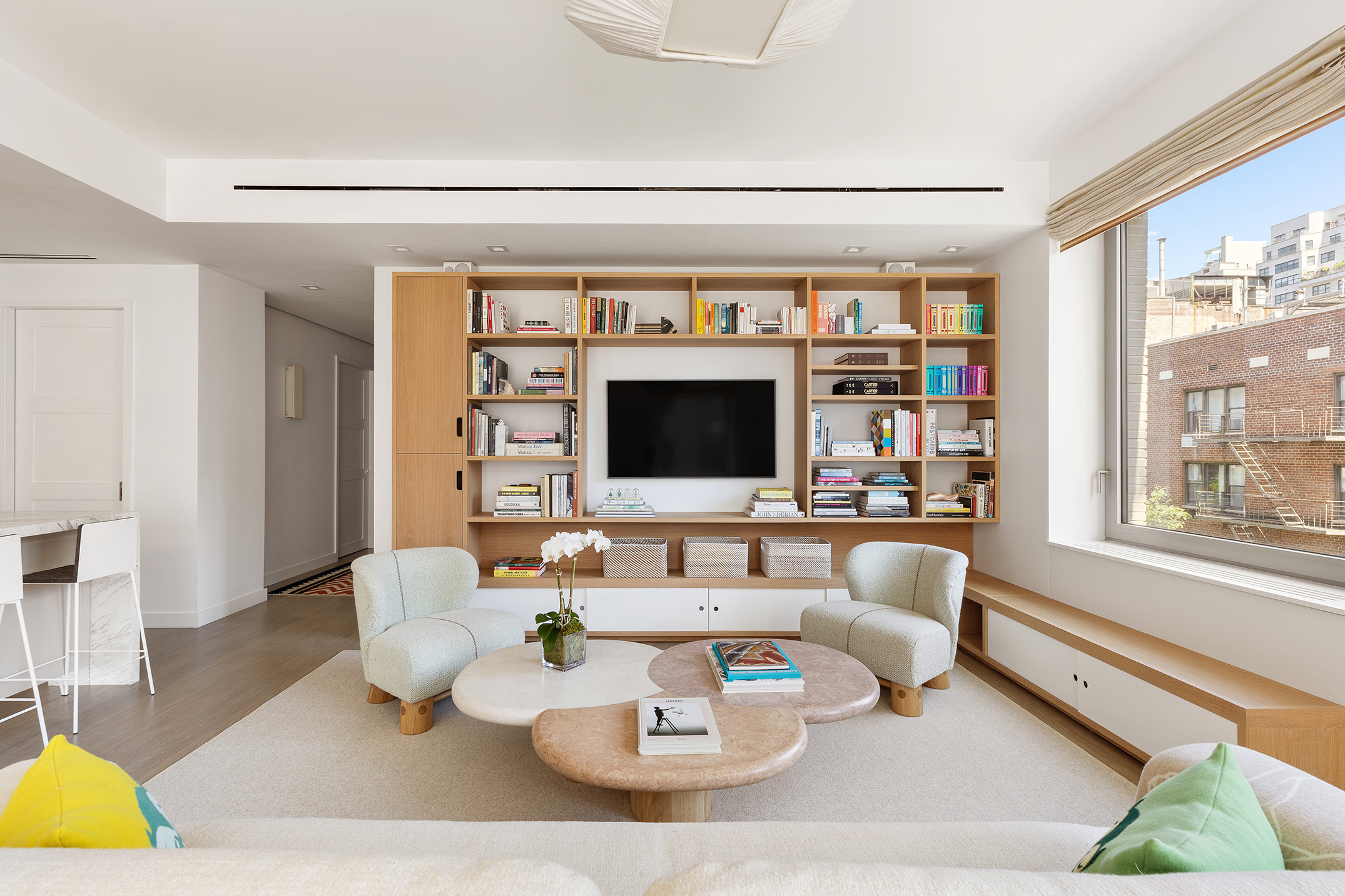 116 University Place, Unit 5 Manhattan, NY 10003 - Photo 5 of 19 a living room with furniture and a flat screen tv