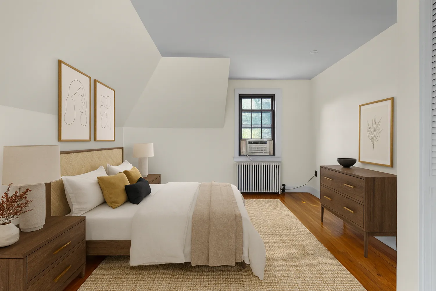 a bedroom with a bed and a dresser