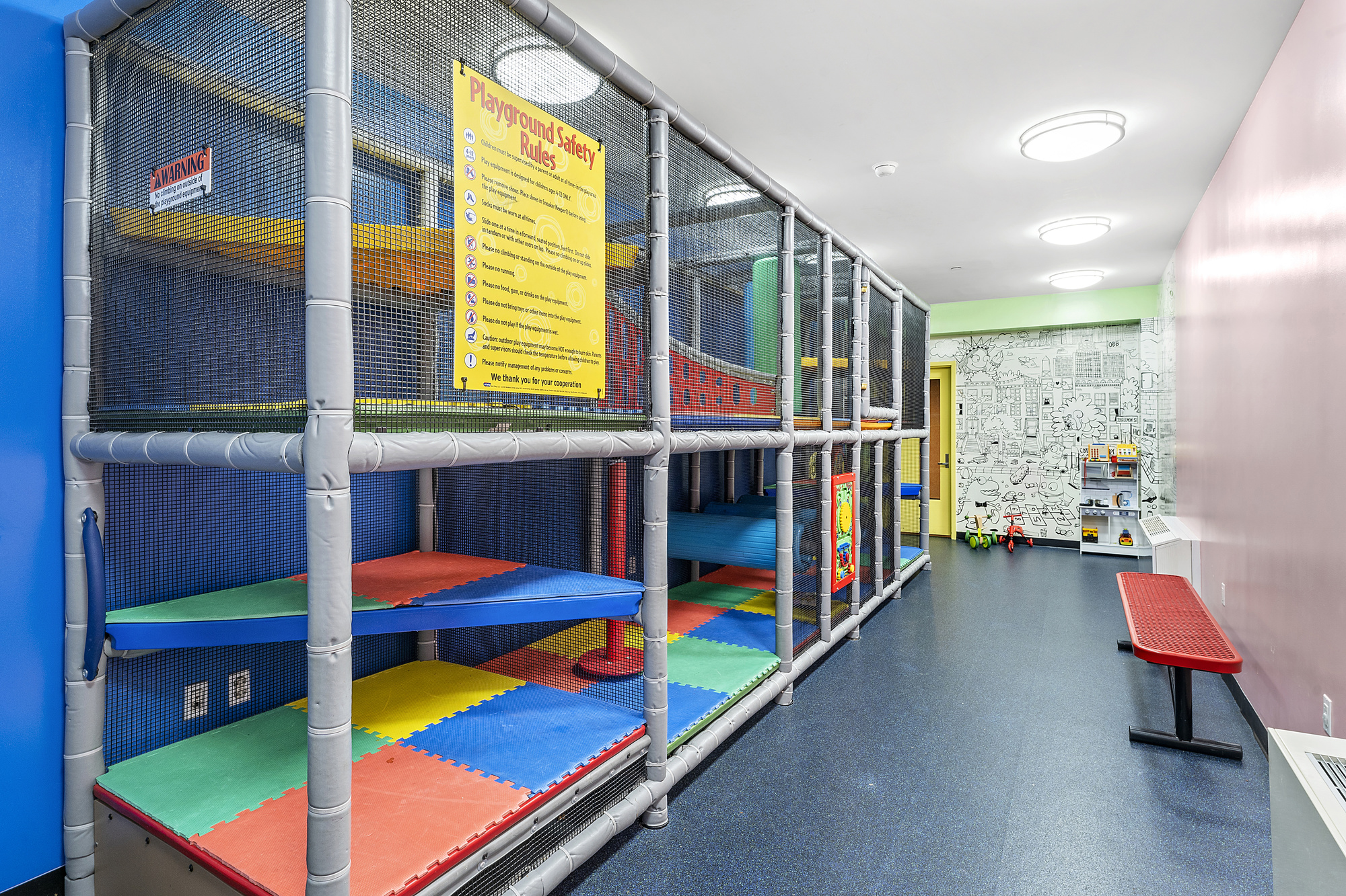 360 Furman Street, Unit 815 Brooklyn, NY 11201 - Photo 22 of 34 a play room with a rug