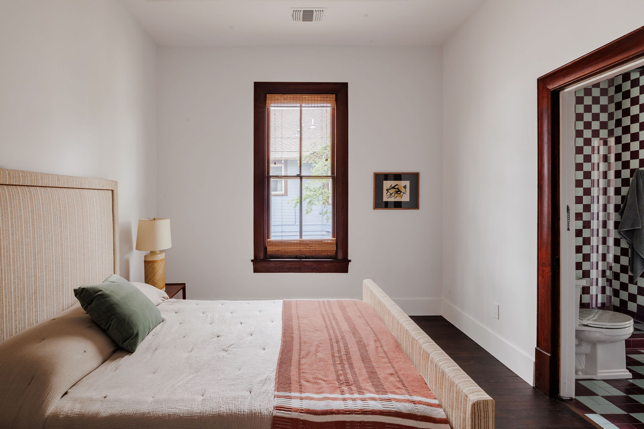 606 West 35th Street Austin, TX 78705 - Photo 28 of 37 a bedroom with a bed and a window