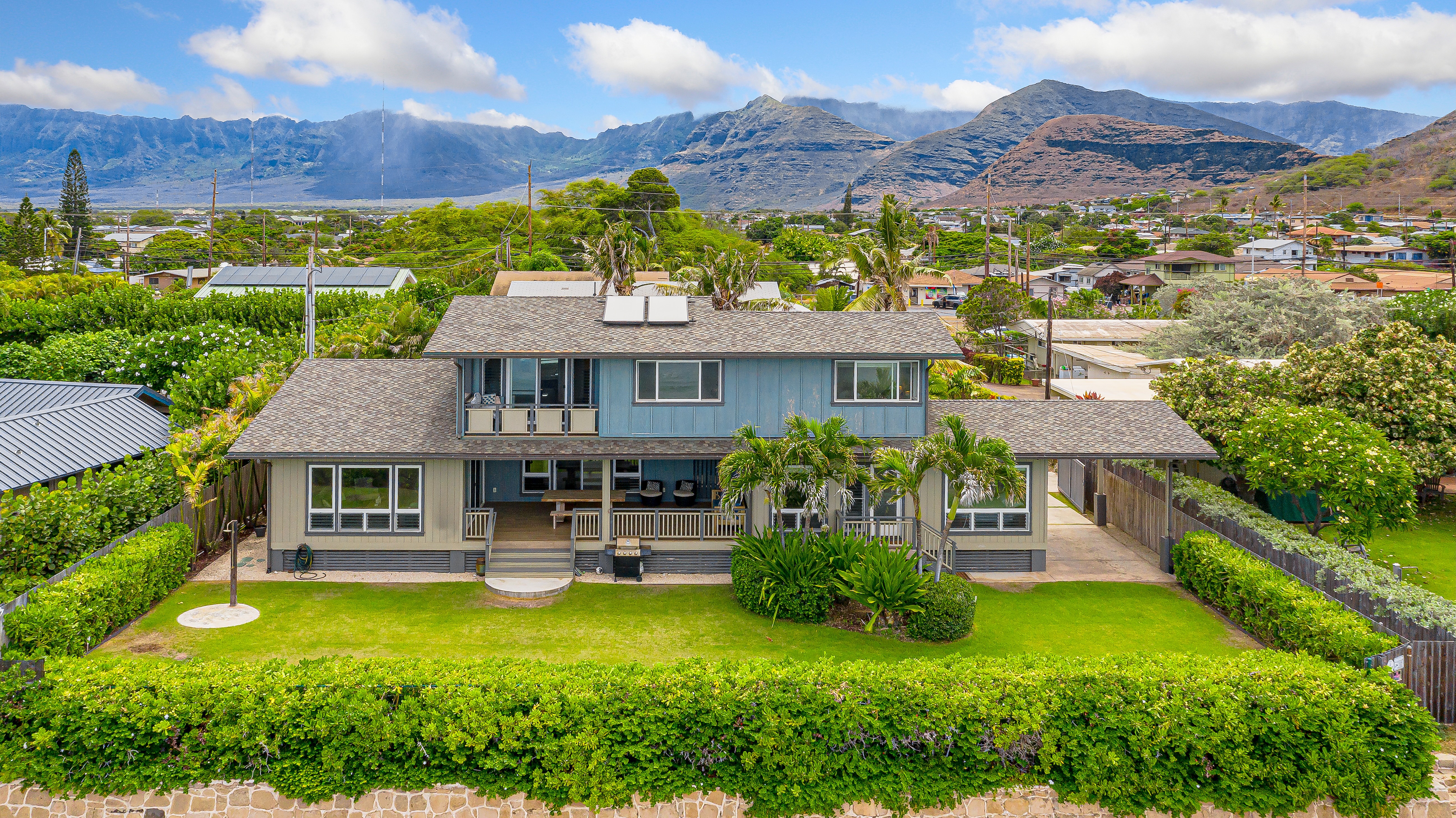 87-849 Farrington Highway, Unit C Waianae, HI 96792 - Photo 26 of 26 an aerial view of a house with balcony and garden