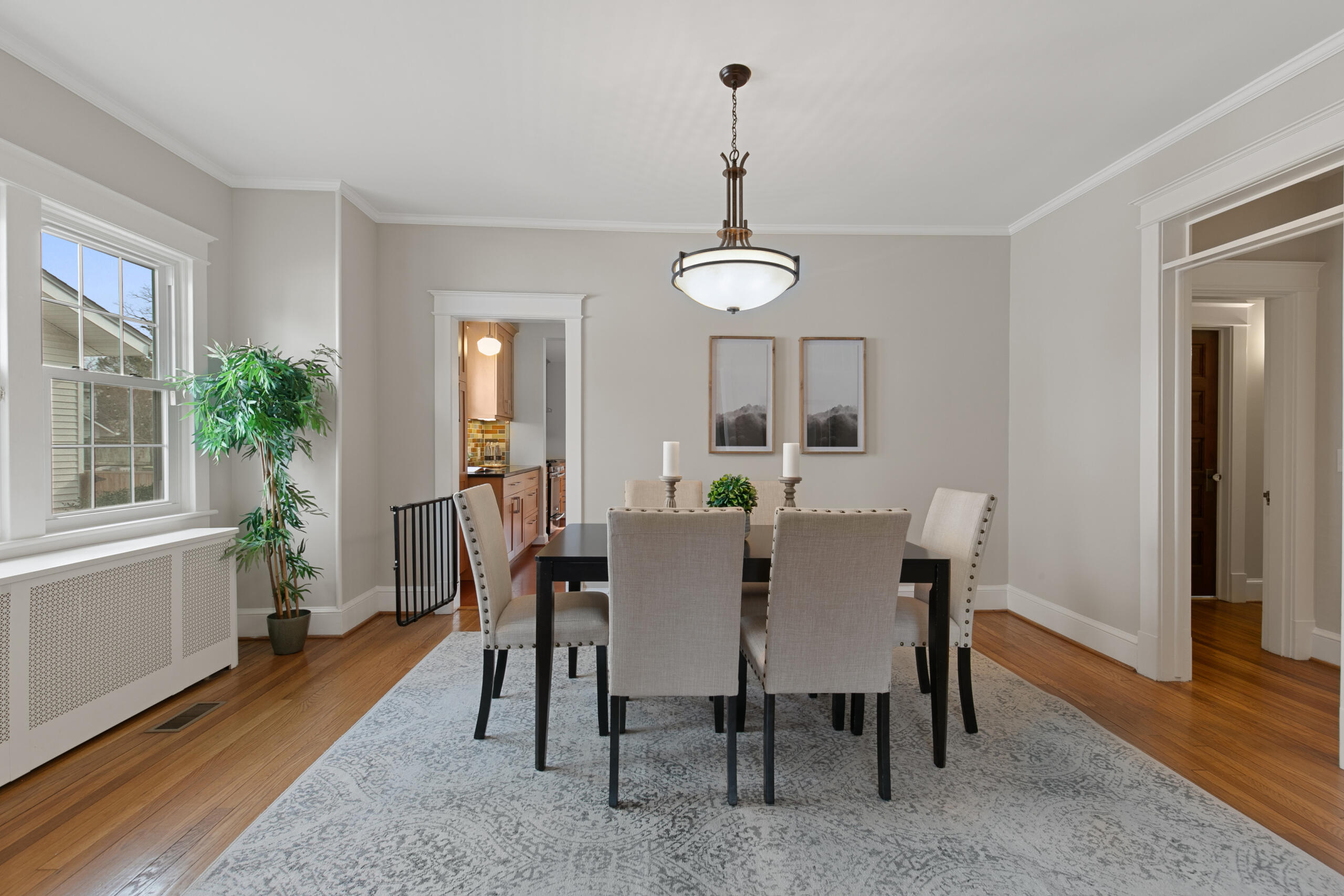 1908 Glen Ross Road Silver Spring, MD 20910 - Photo 16 of 63 a view of a dining room with furniture and wooden floor