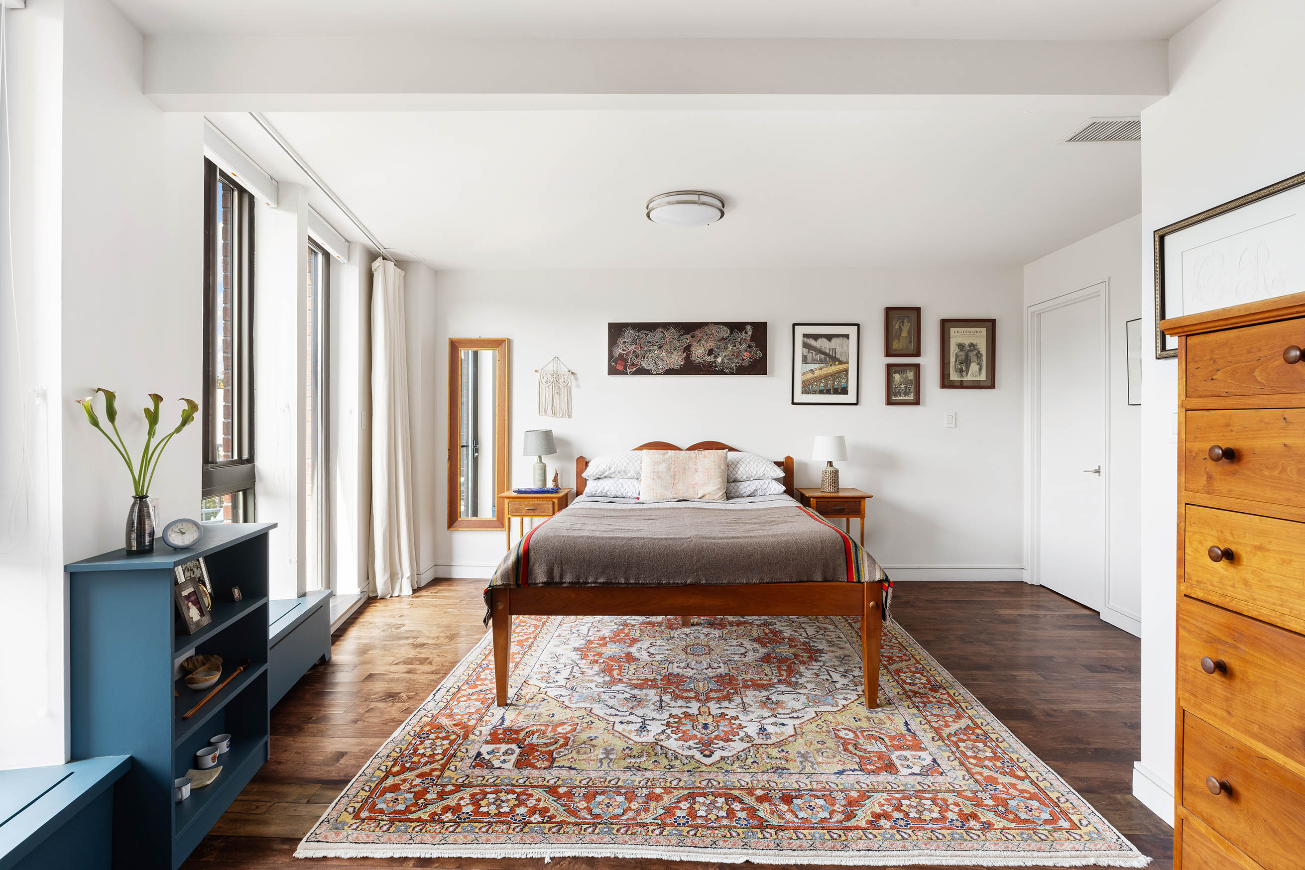 336 Saint Marks Avenue, Unit PH5A Brooklyn, NY 11238 - Photo 5 of 12 a bedroom with a bed and a dresser