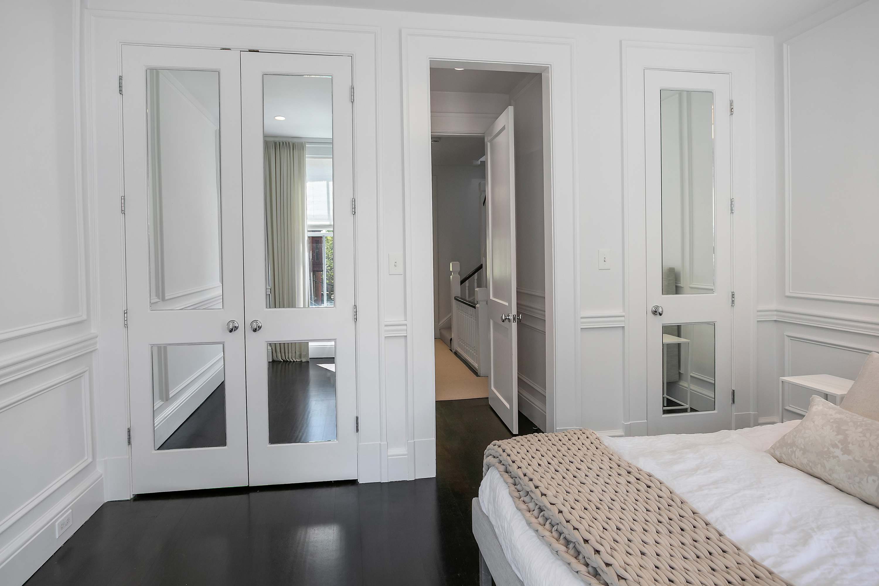 1832 Corcoran Street Northwest Washington, DC 20009 - Photo 12 of 29 a bedroom with a bed and wooden floor