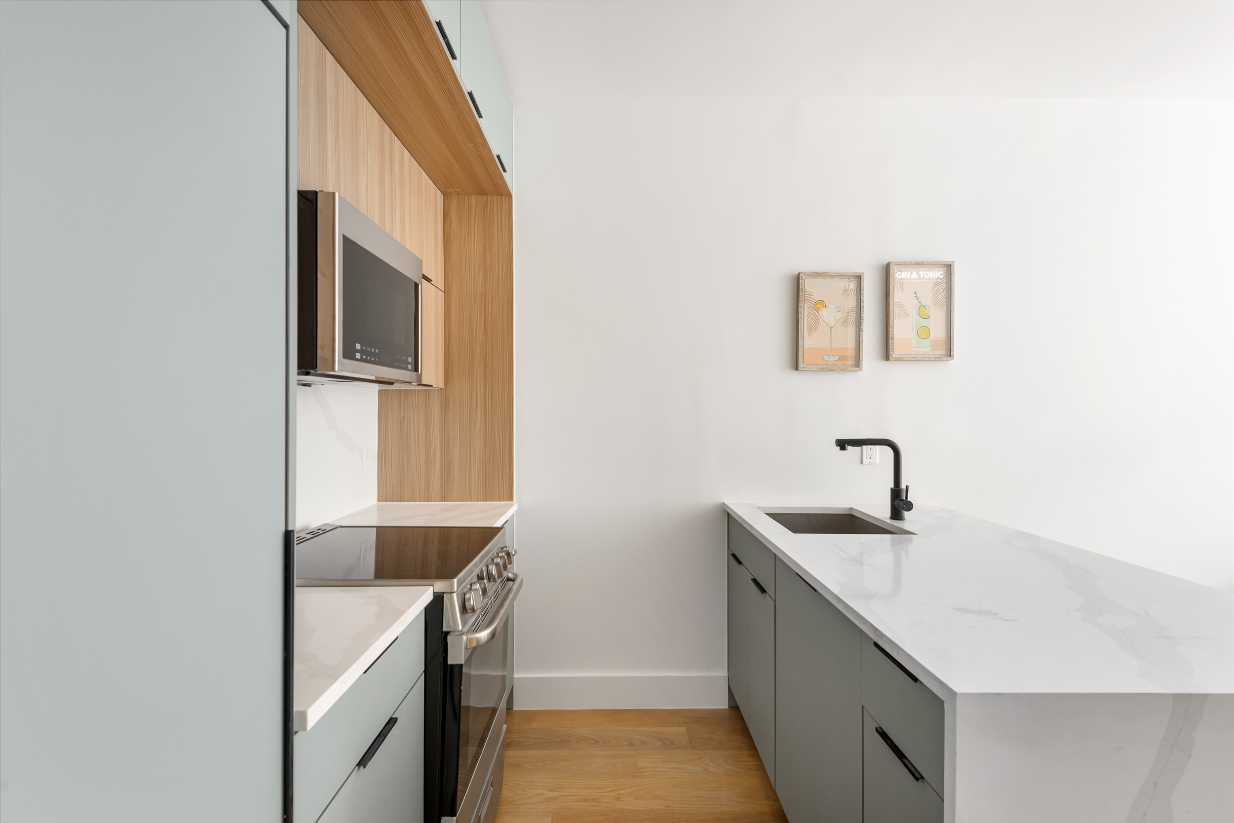 140 Moffat Street, Unit 1 Brooklyn, NY 11207 - Photo 4 of 9 a bathroom with a sink and a mirror