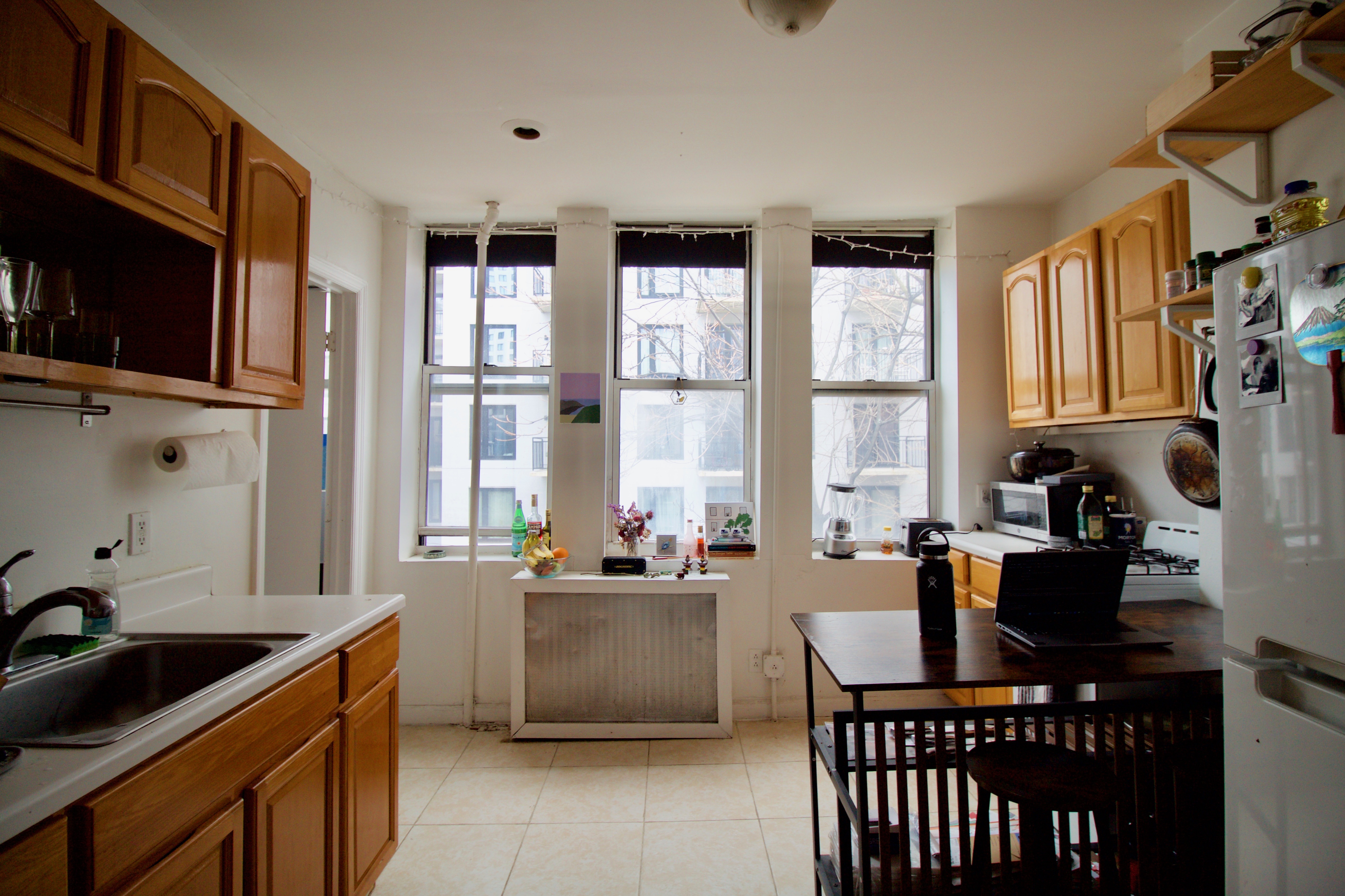 55 Duffield Street, Unit 3 Brooklyn, NY 11201 - Photo 9 of 14 a kitchen with stainless steel appliances a stove a sink and a refrigerator