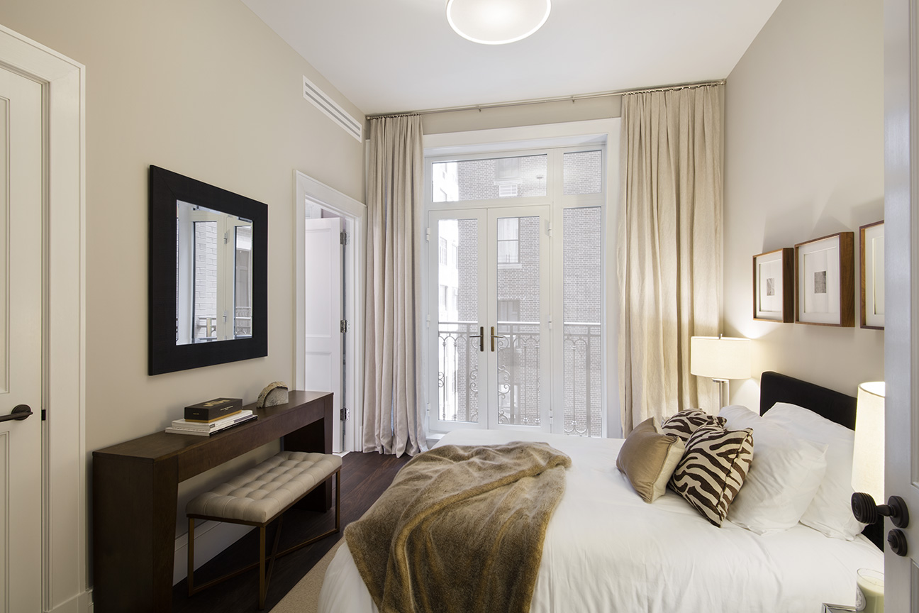 1110 Park Avenue, Unit C Manhattan, NY 10128 - Photo 7 of 9 a bedroom with a bed and a window