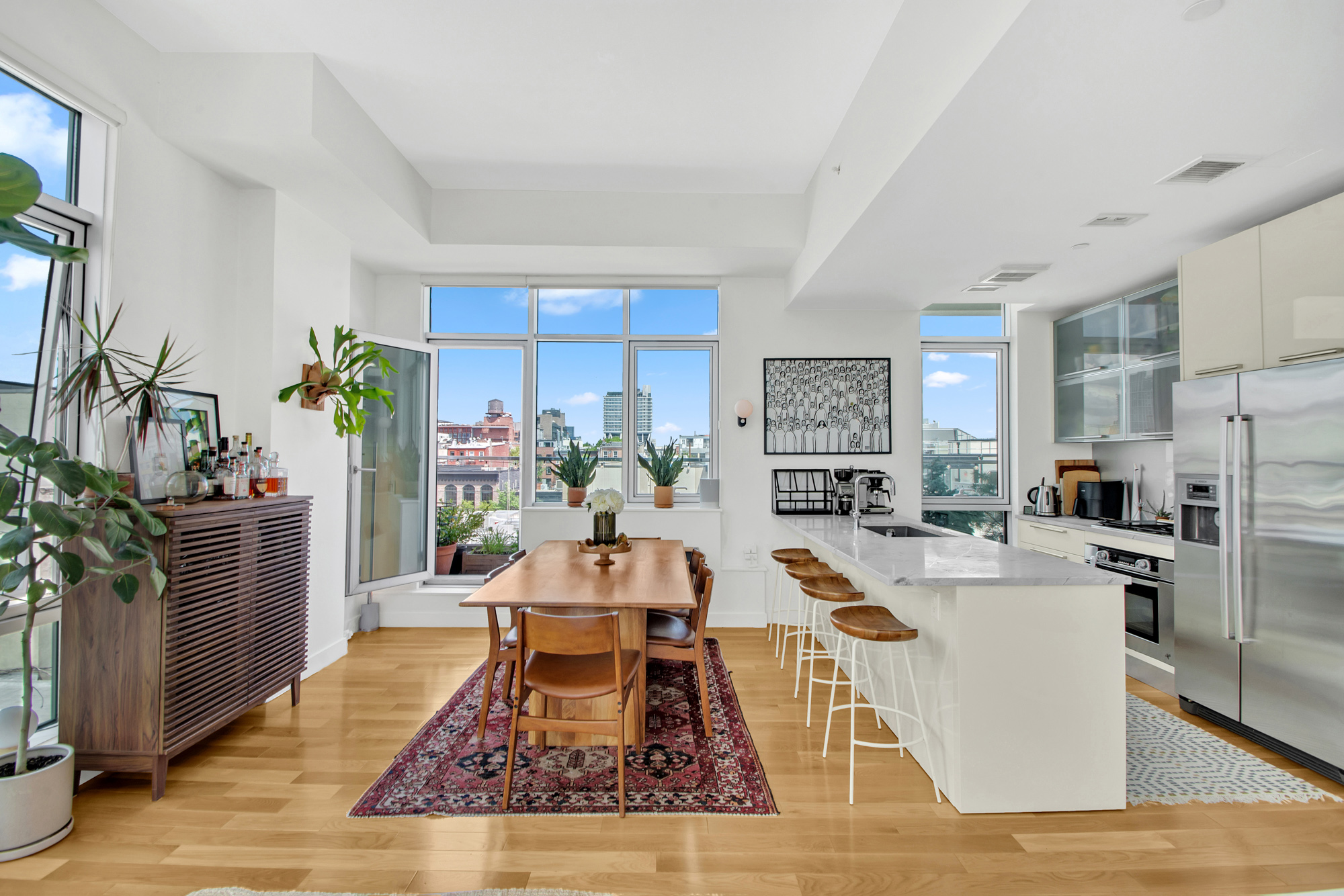 101 North 5th Street, Unit 5A Brooklyn, NY 11249 - Photo 5 of 26 a living room with furniture wooden floor and a fireplace