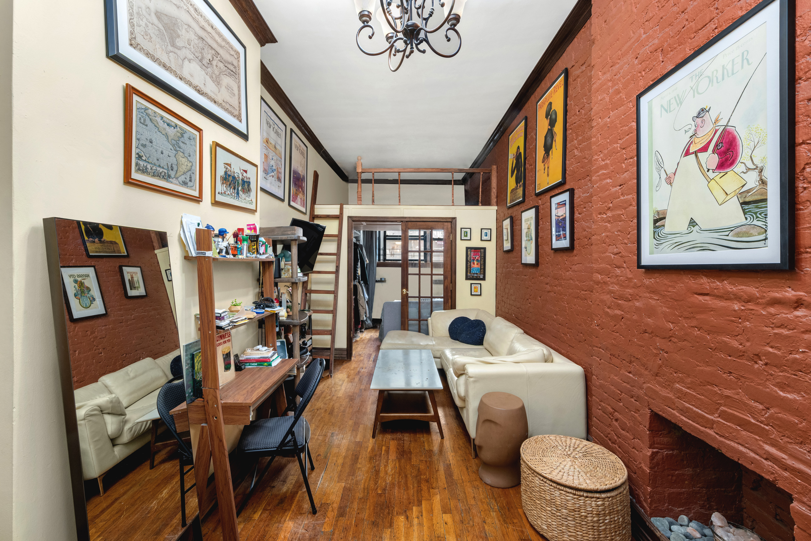 a view of a room with furniture and rug