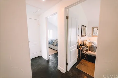 a view of utility room and bedroom