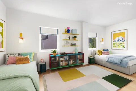 a living room with furniture and window