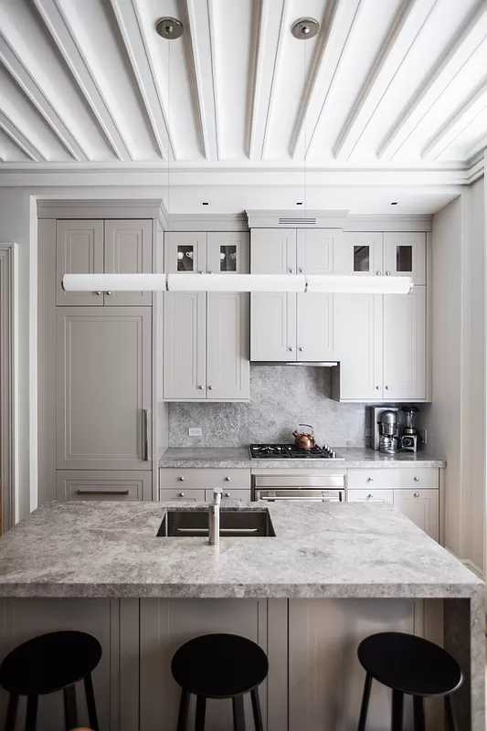 390 West End Avenue, Unit 7DS Manhattan, NY 10024 - Photo 9 of 31 a kitchen with granite countertop a sink a stove and cabinets