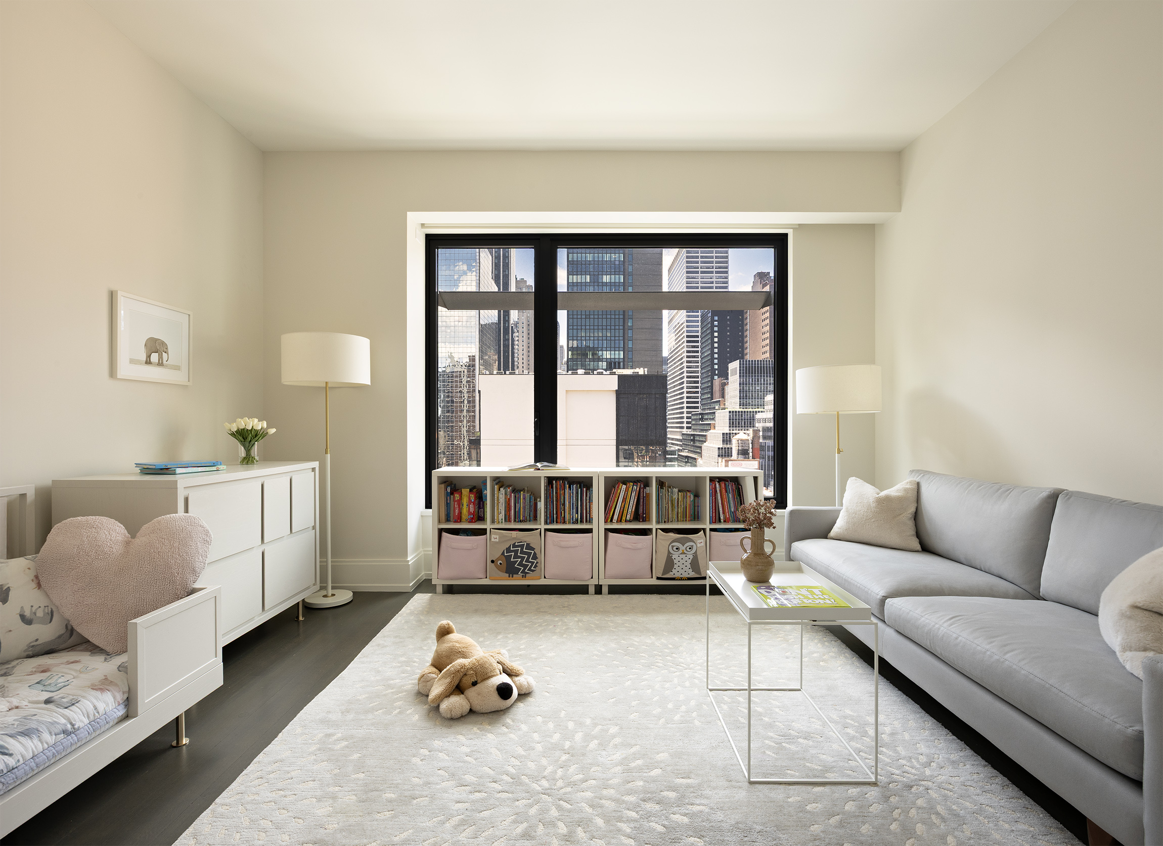 301 East 50th Street, Unit 16B Manhattan, NY 10022 - Photo 7 of 15 a living room with furniture and a window