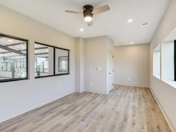 a view of hallway with a large window