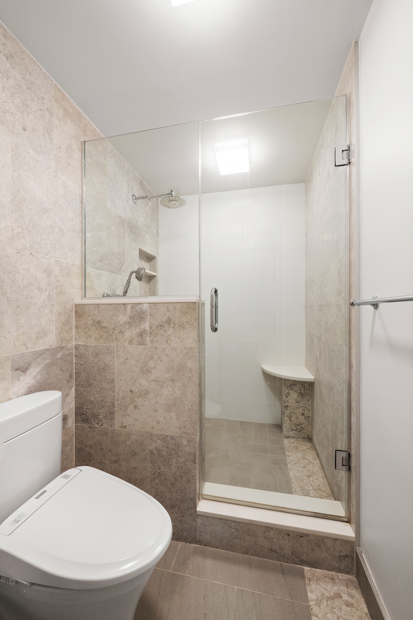 10 West 15th Street, Unit 1027/1028 Manhattan, NY 10011 - Photo 8 of 15 a bathroom with a toilet and a shower