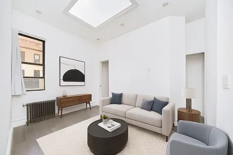 a living room with furniture and a couch