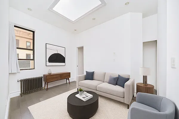 a living room with furniture and a couch