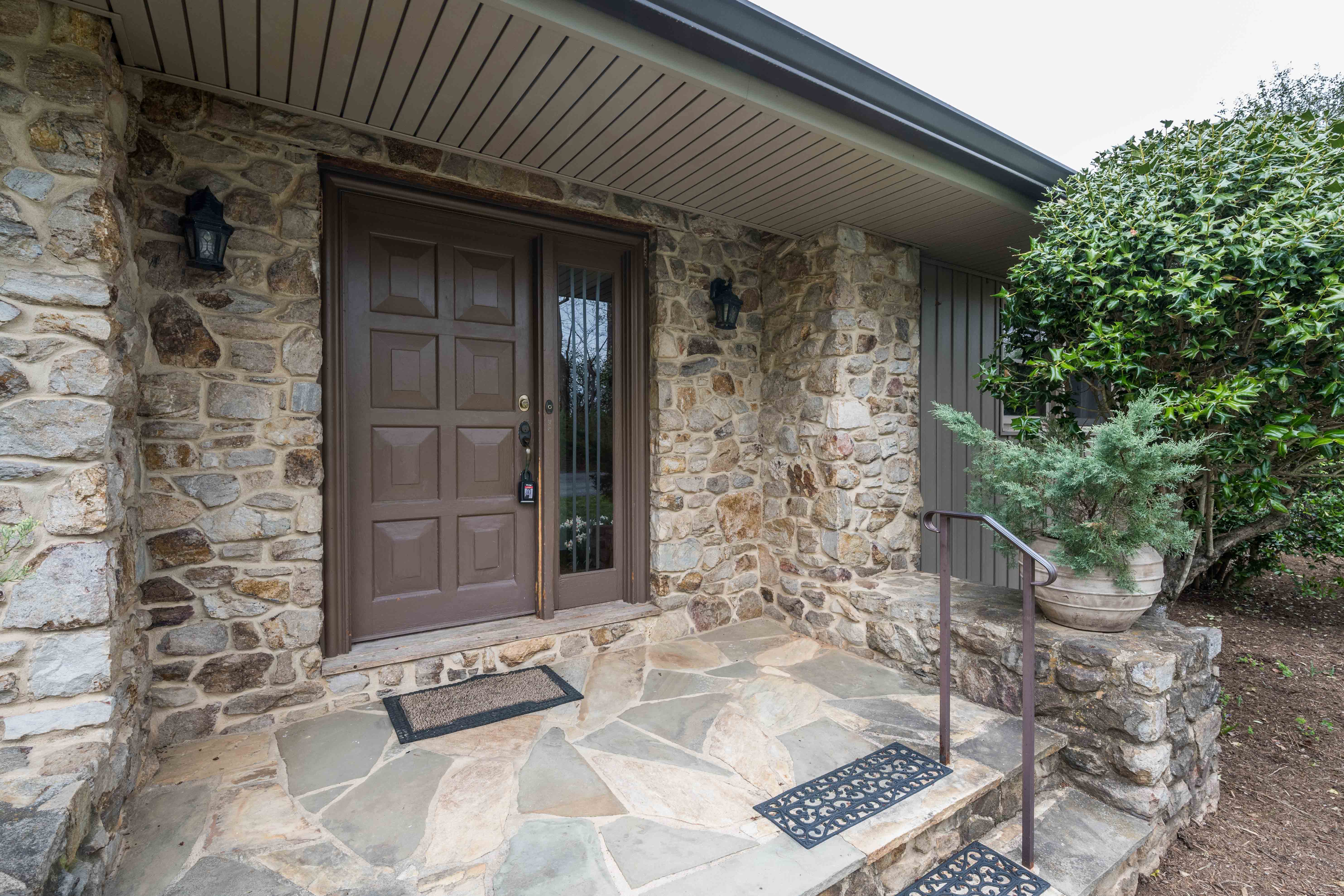 21730 Peach Tree Road Dickerson, MD 20842 - Photo 4 of 11 a view of a wooden door and chair