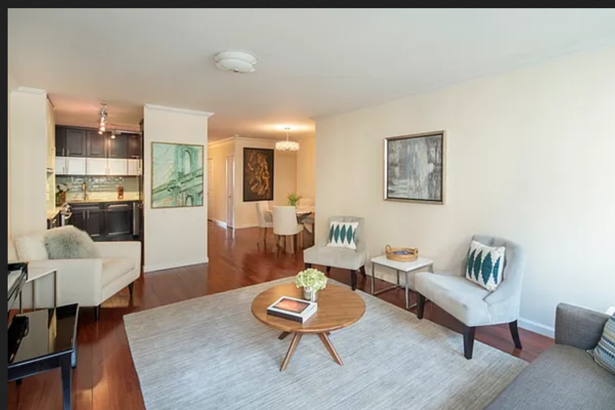 255 West 85th Street, Unit 7A Manhattan, NY 10024 - Photo 2 of 7 a living room with furniture and a dining table with wooden floor