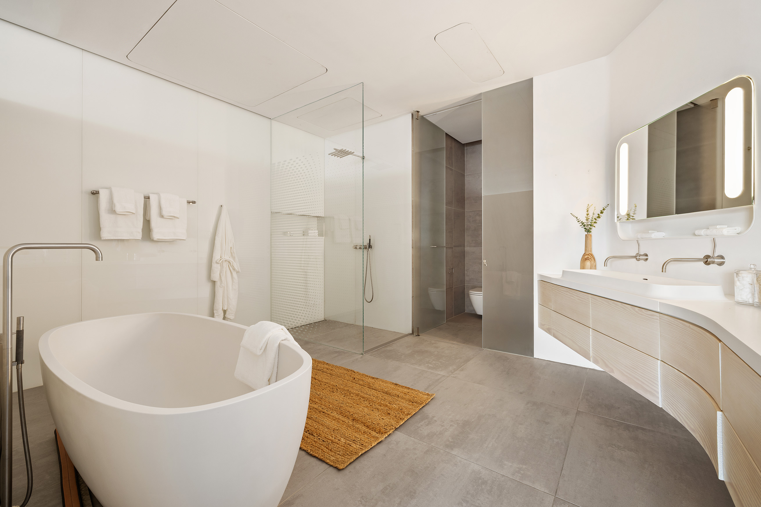 12 East 12th Street, Unit 9NS Manhattan, NY 10003 - Photo 14 of 21 a white bath tub sitting in a bathroom
