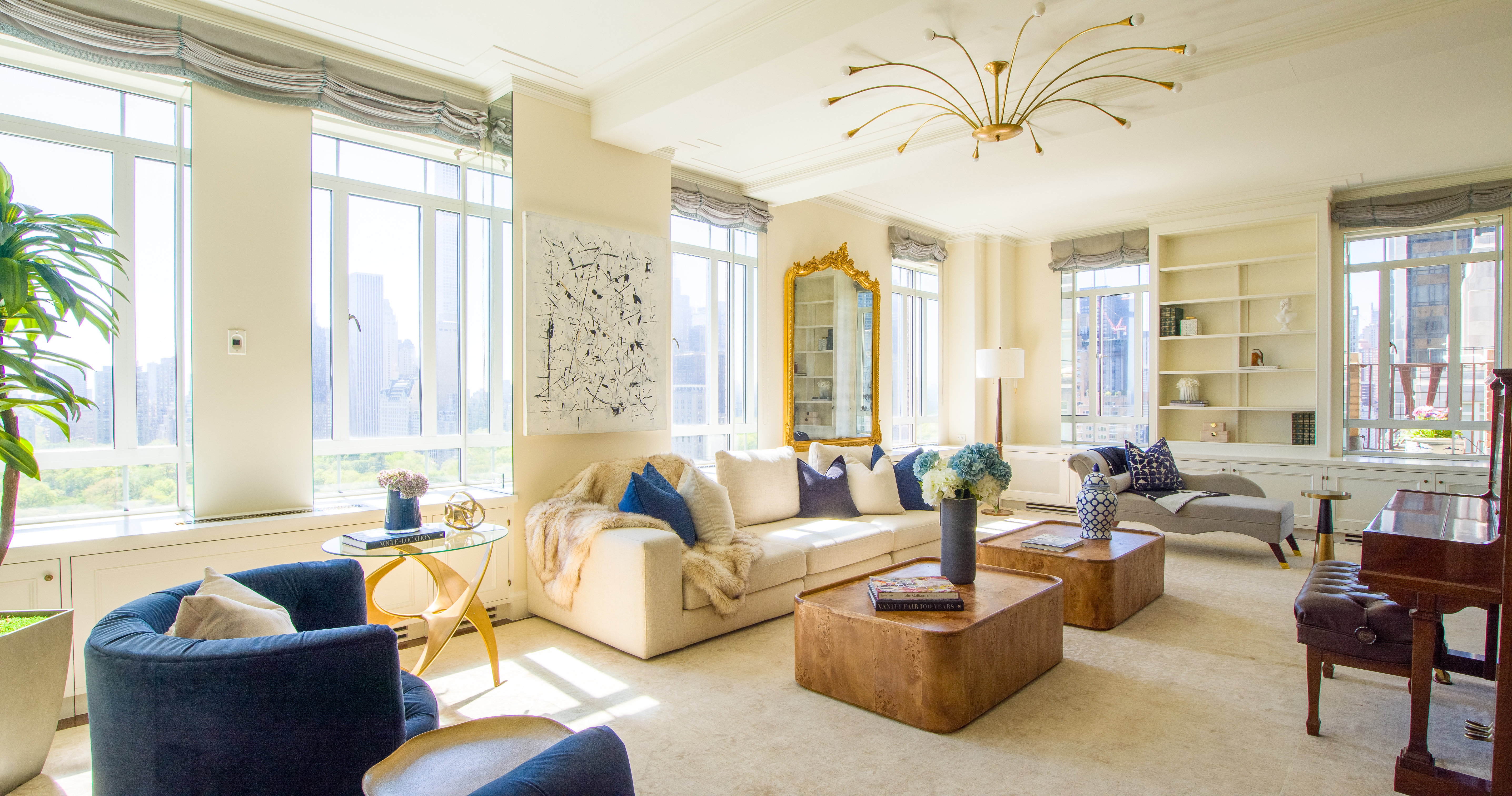 25 Central Park West, Unit 21J Manhattan, NY 10023 - Photo 3 of 37 a living room with furniture and floor to ceiling windows