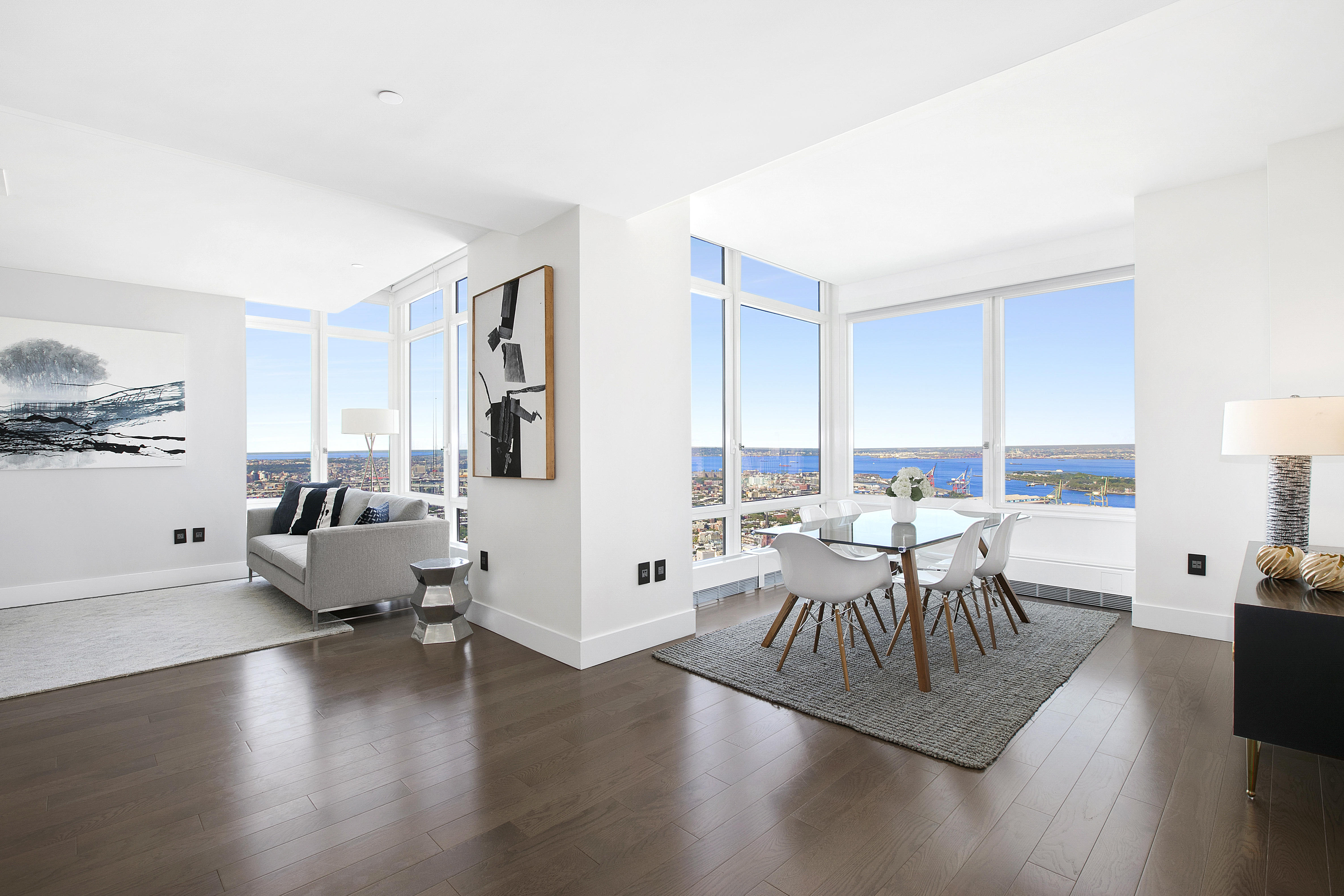 388 Bridge Street, Unit PH45AB Brooklyn, NY 11201 - Photo 7 of 36 a living room with furniture and wooden floor