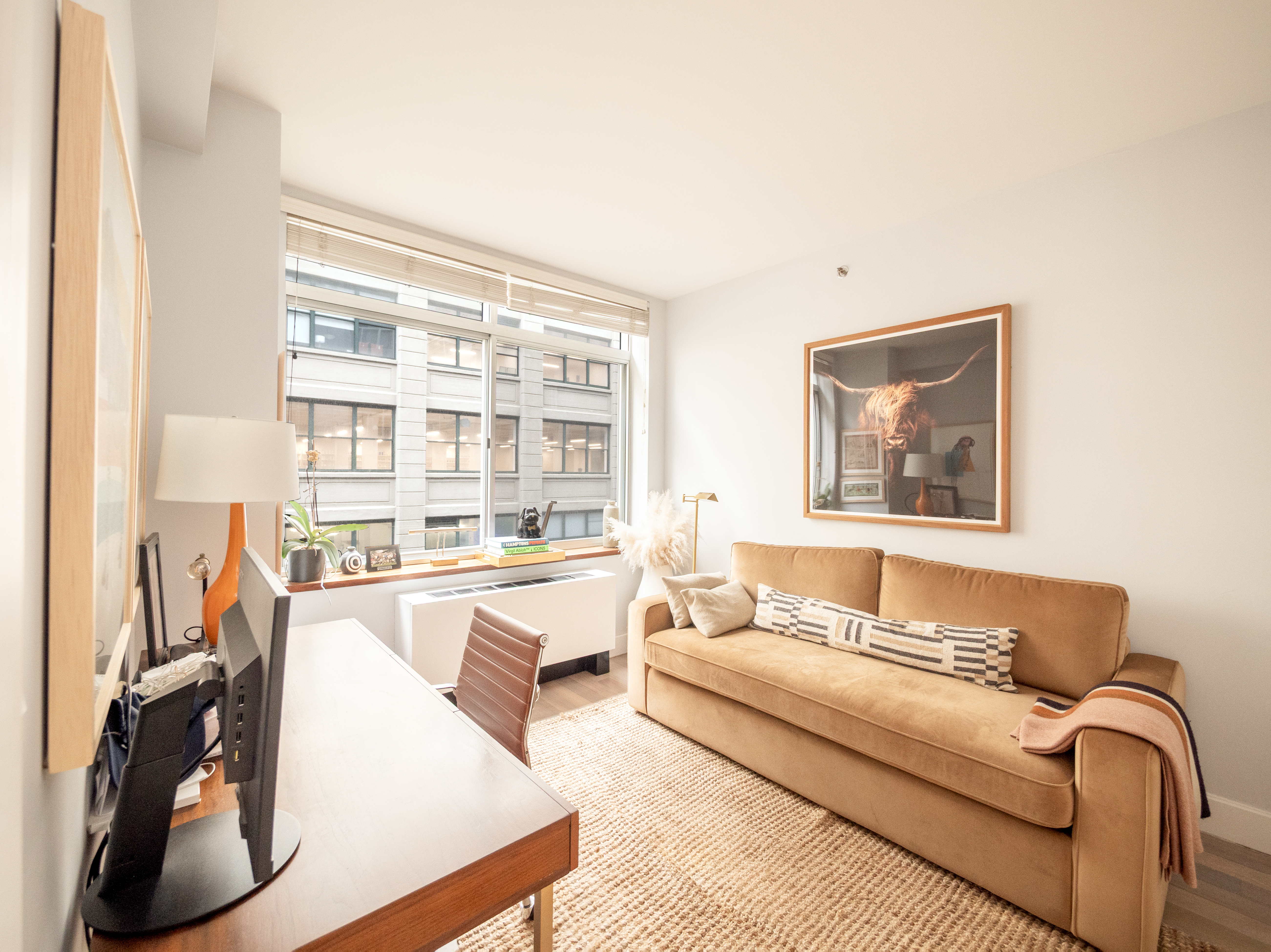 84 Front Street, Unit 5E Brooklyn, NY 11201 - Photo 9 of 11 a living room with furniture and a large window