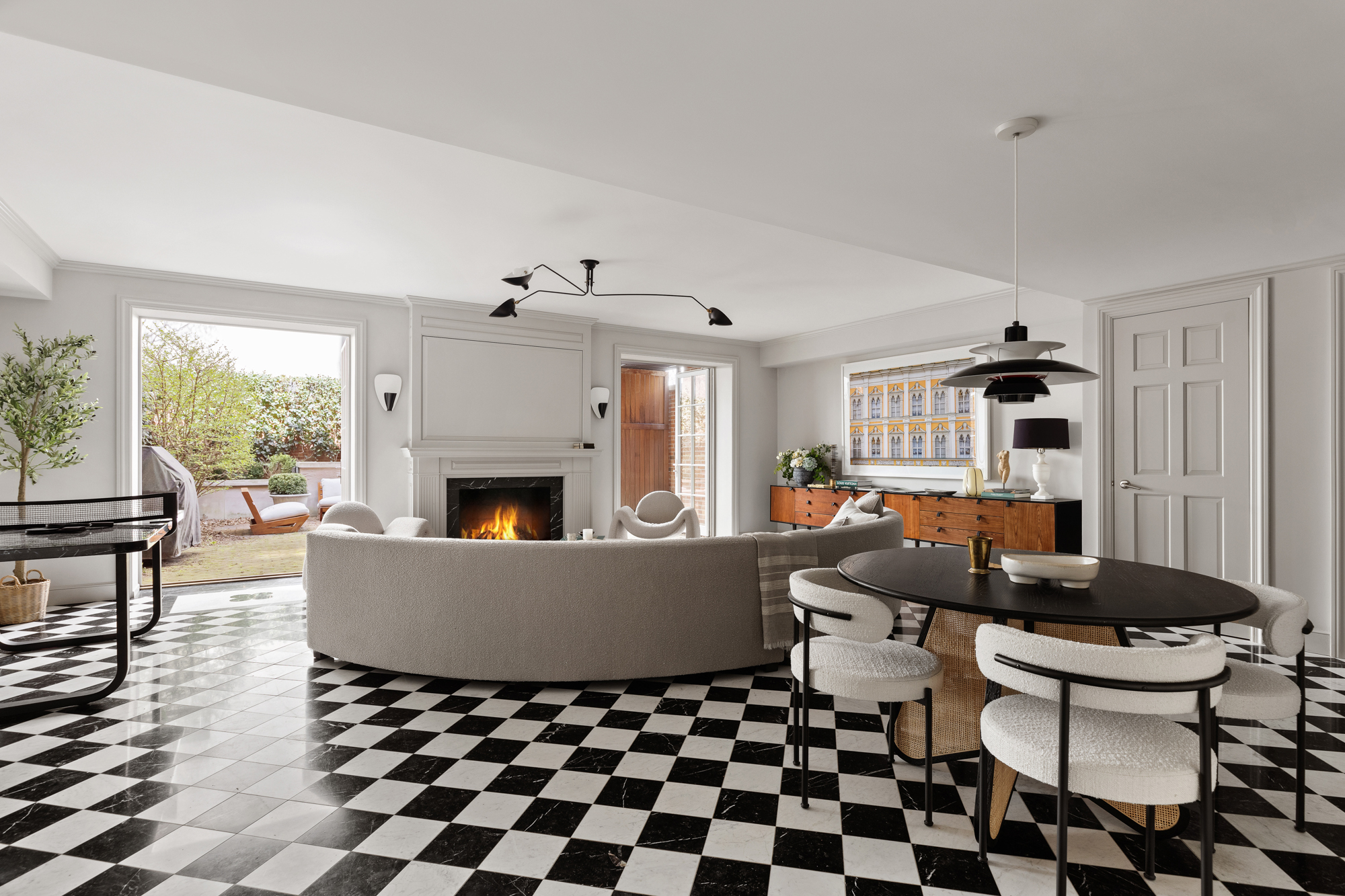 400 West 12th Street, Unit TH3 Manhattan, NY 10014 - Photo 11 of 29 a living room with a couch and a fireplace