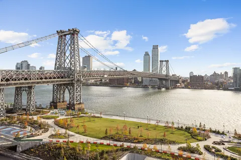 a view of a lake with a large building