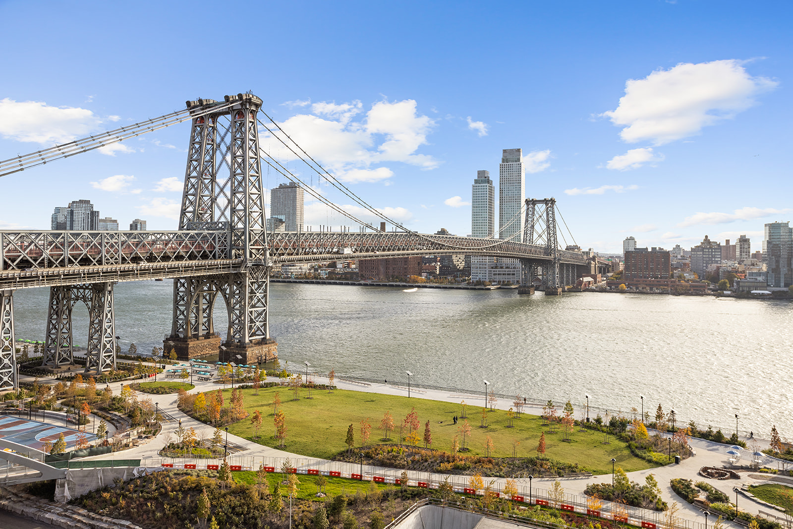 473 FDR Drive, Unit K1401 Manhattan, NY 10002 - Photo 9 of 11 a view of a lake with a large building