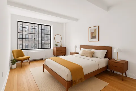 a bedroom with a bed and a chair