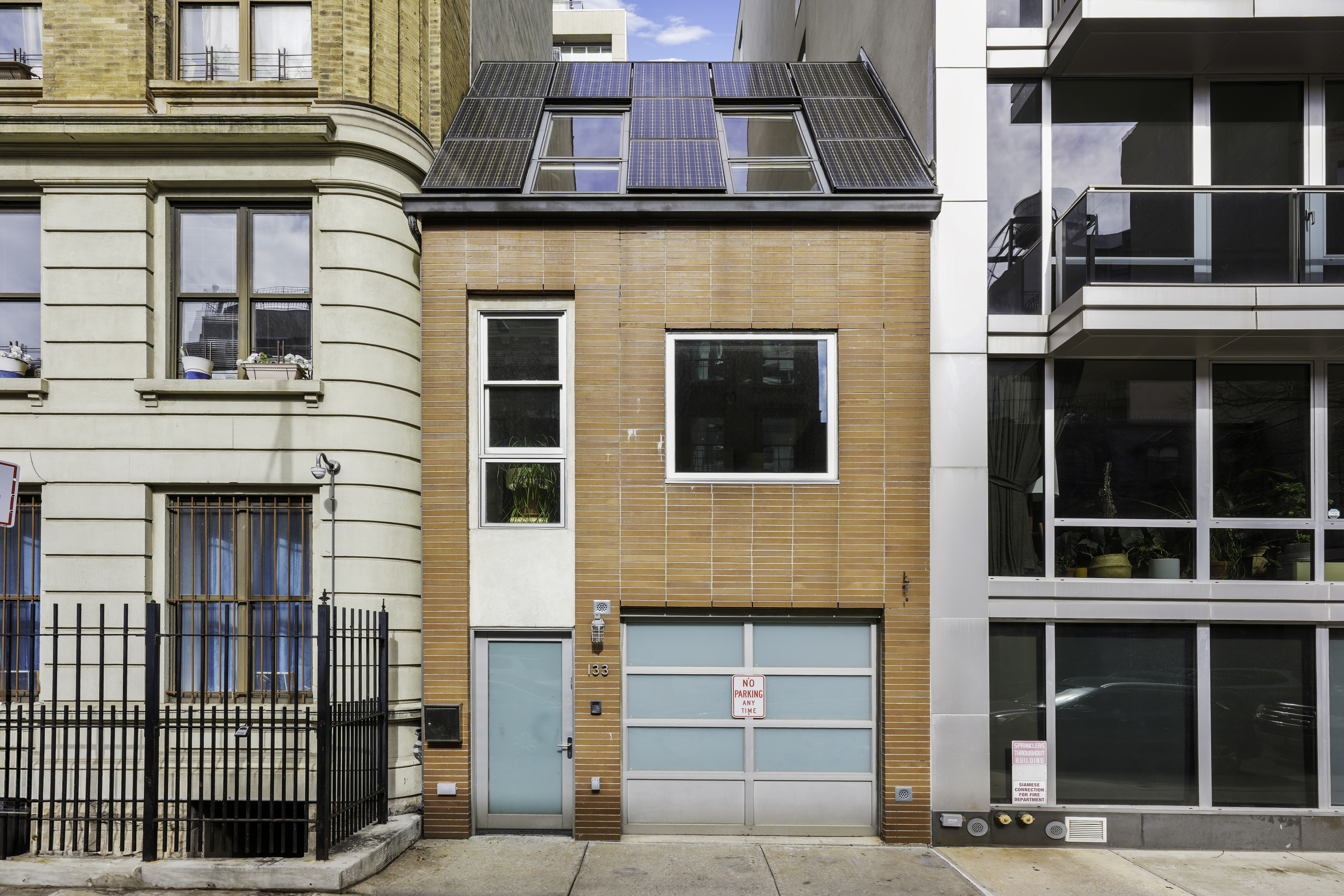 133 West 123rd Street Manhattan, NY 10027 - Photo 4 of 31 a building with a window and balcony
